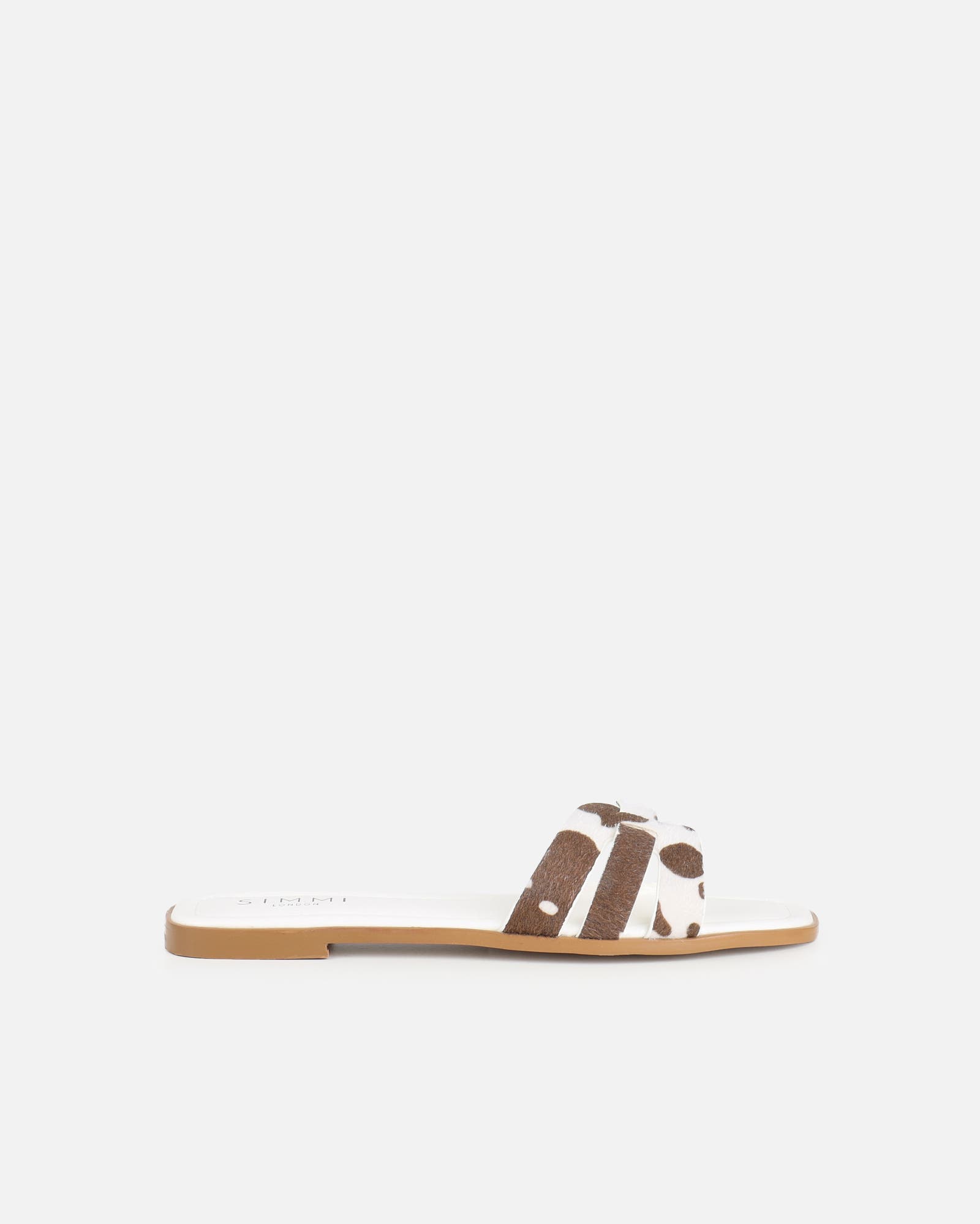 Jorja Cow Print Slip On Flat Sandals | SIMMI London