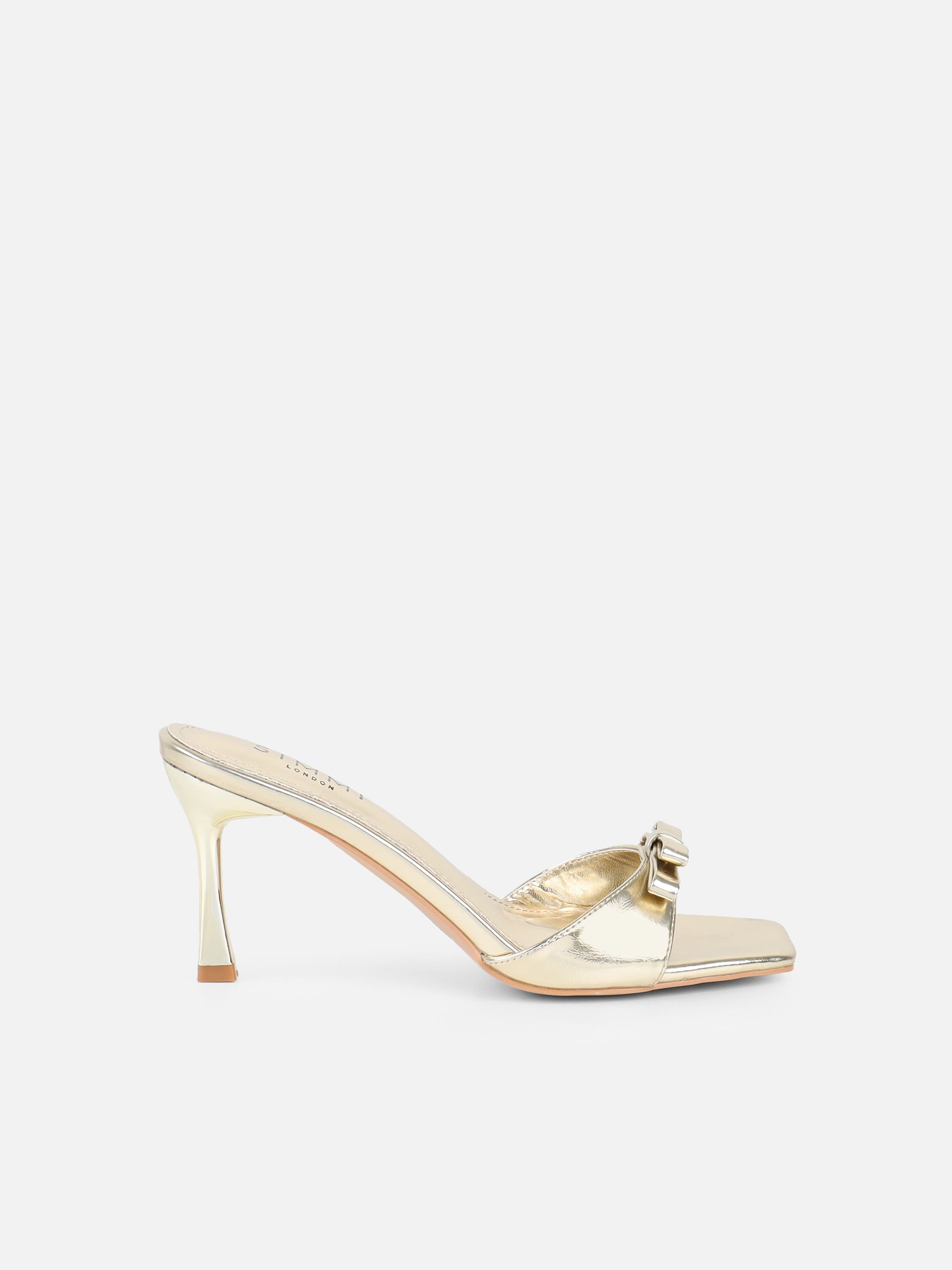 Polen Gold Metallic Bow Detail Mules | SIMMI London