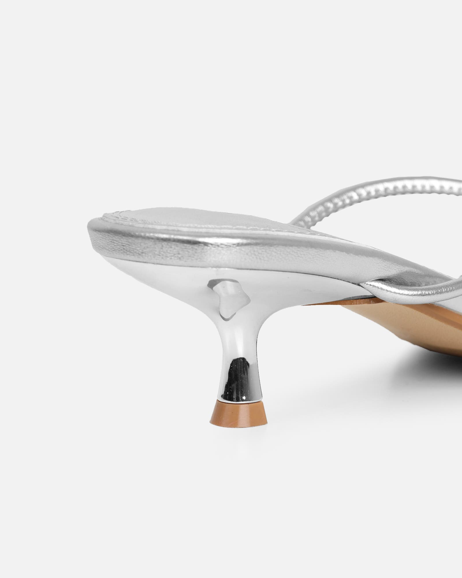 Haylen Silver Metallic Knotted Mules | SIMMI London