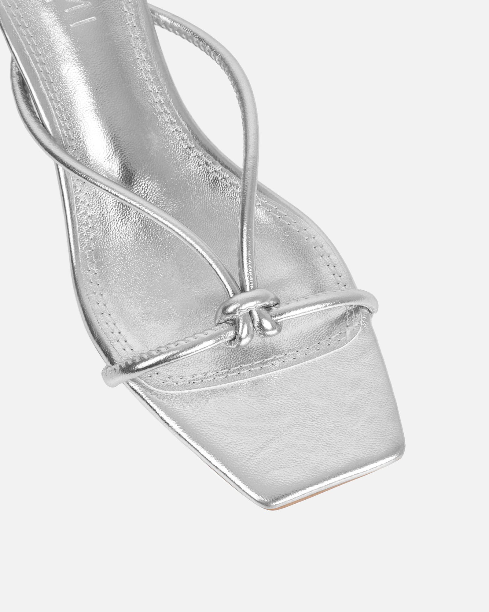 Haylen Silver Metallic Knotted Mules | SIMMI London