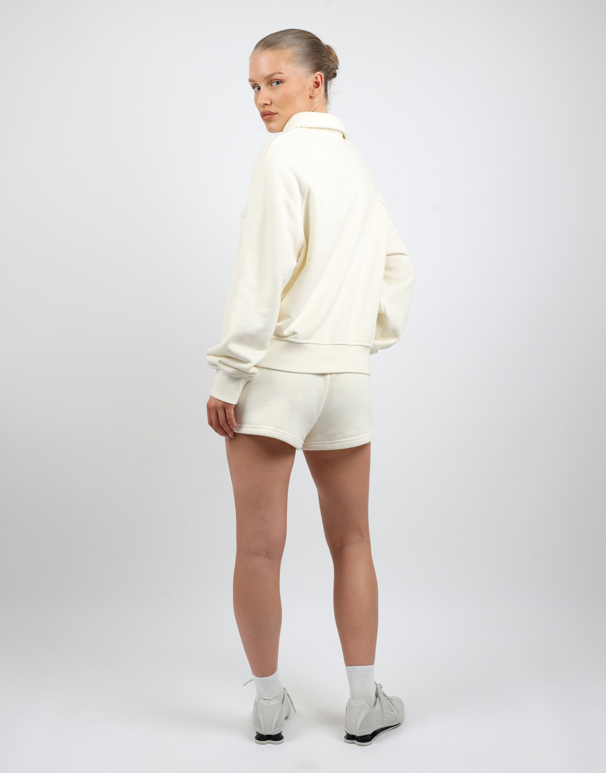Monaco Simmi Studios Embroidered Logo Polo Sweatshirt In Cream | SIMMI London