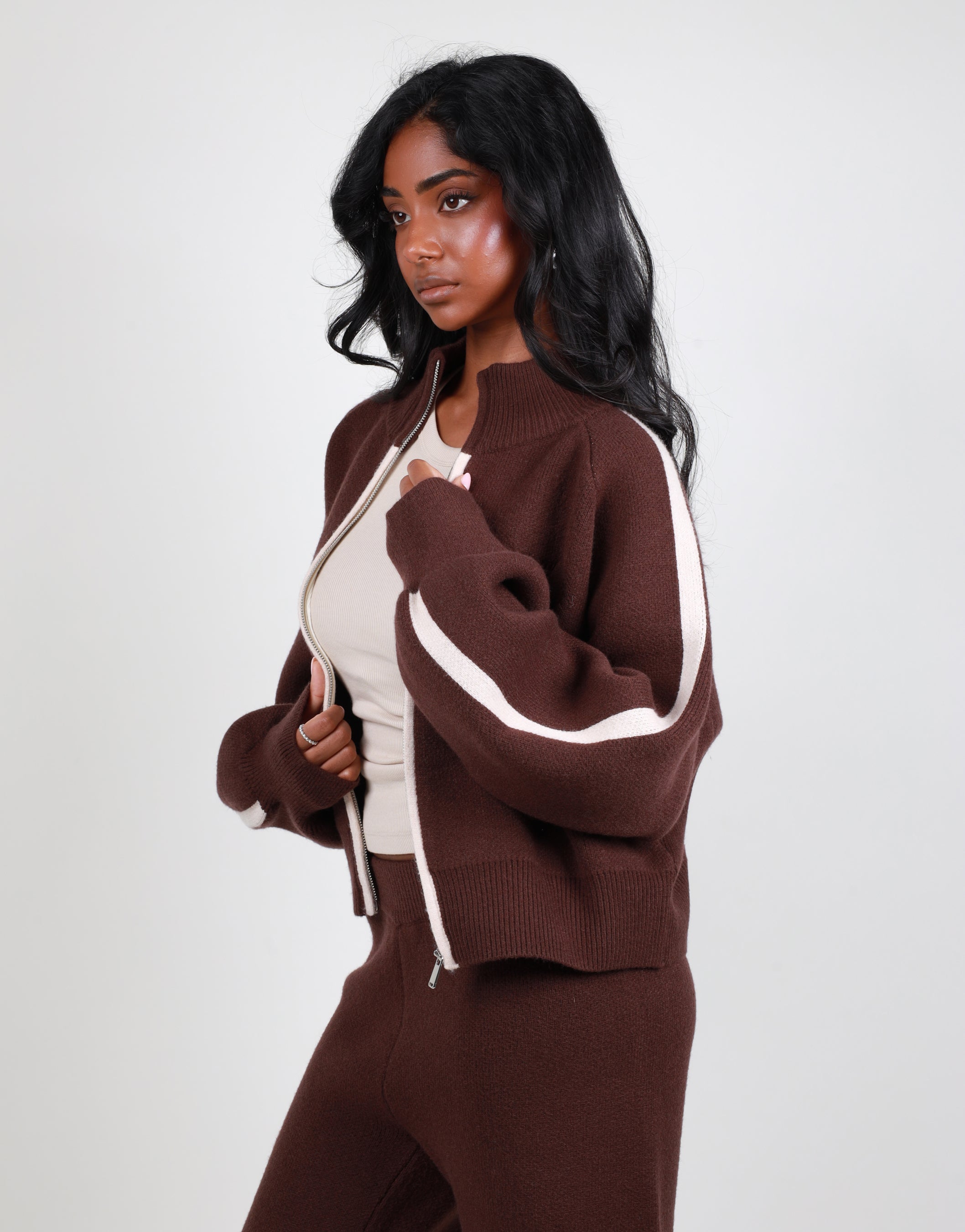 Juliette Stripe jacquard knit high neck zip through in brown | SIMMI London