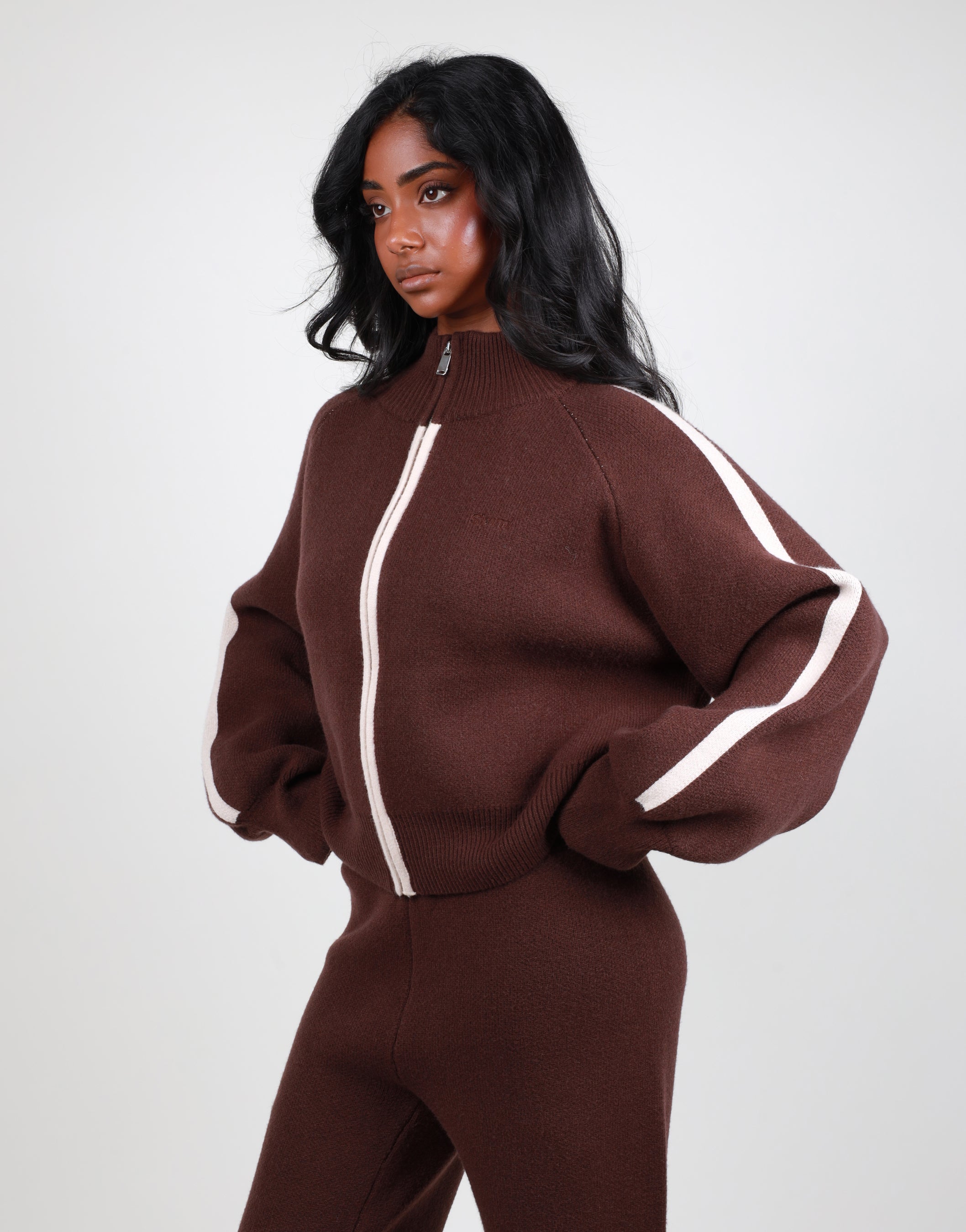 Juliette Stripe jacquard knit high neck zip through in brown | SIMMI London