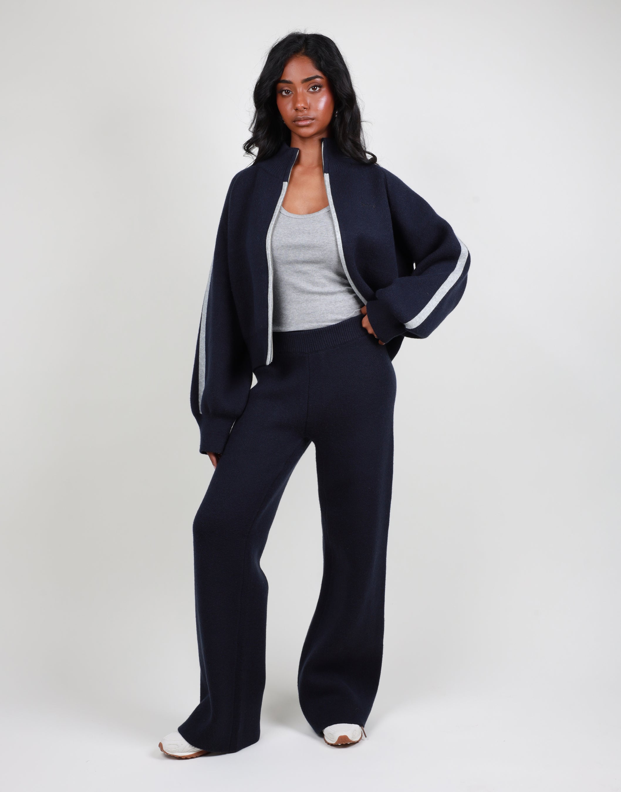 Juliette Stripe jacquard knit high neck zip through in navy | SIMMI London