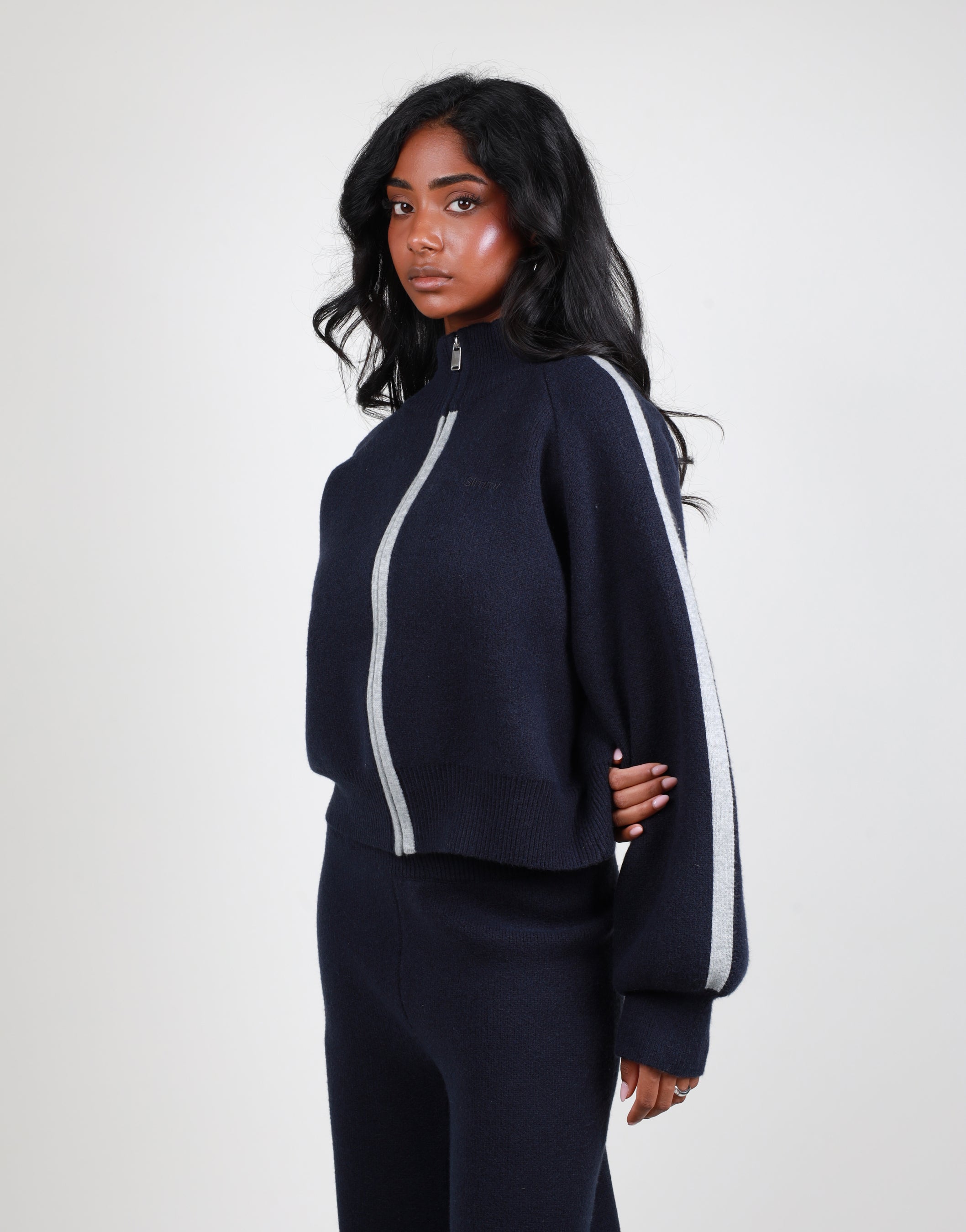 Juliette Stripe jacquard knit high neck zip through in navy | SIMMI London