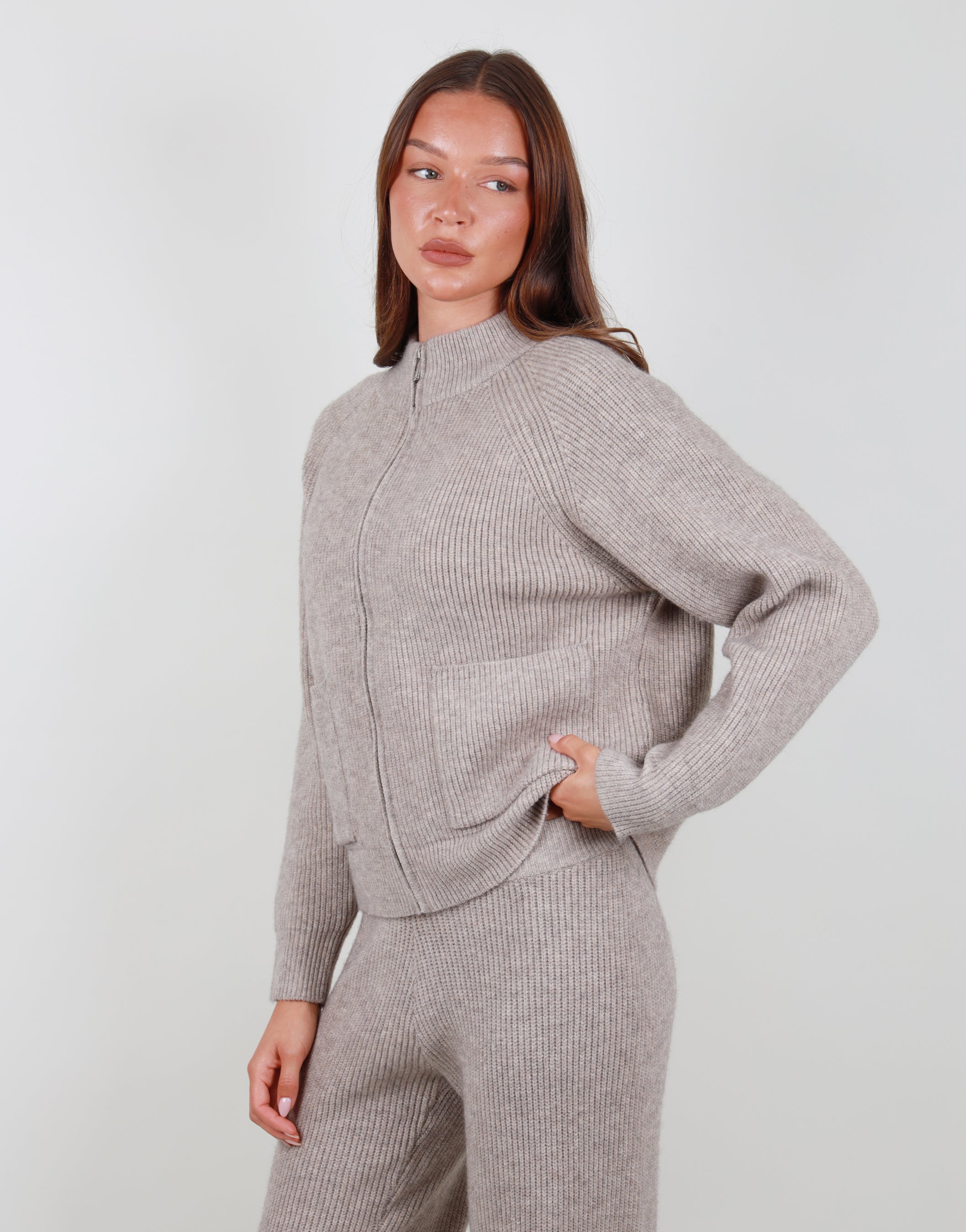 Celeste Ribbed Zip funnel neck sweatshirt in beige | SIMMI London