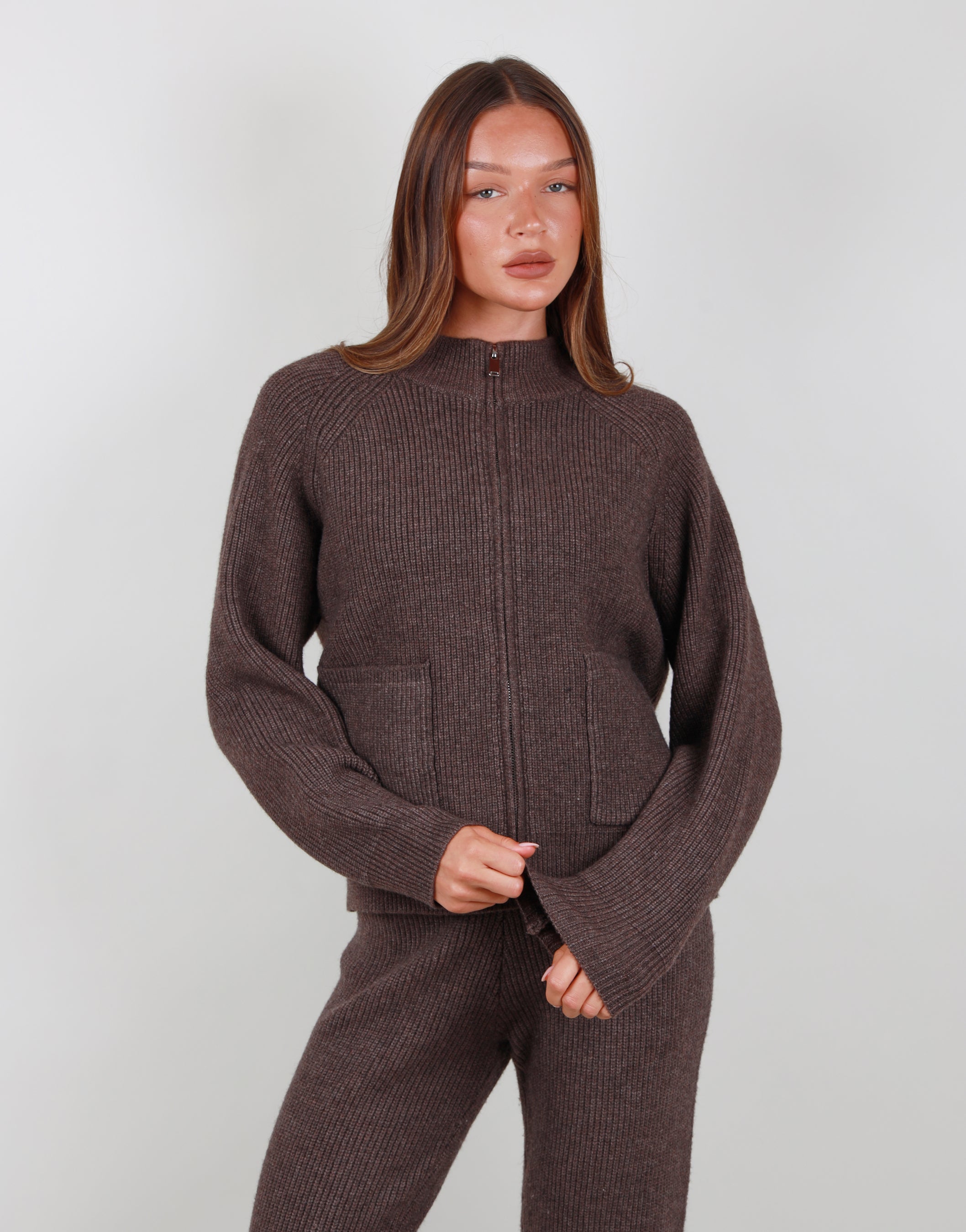 Celeste Ribbed Zip funnel neck sweatshirt in Brown | SIMMI London