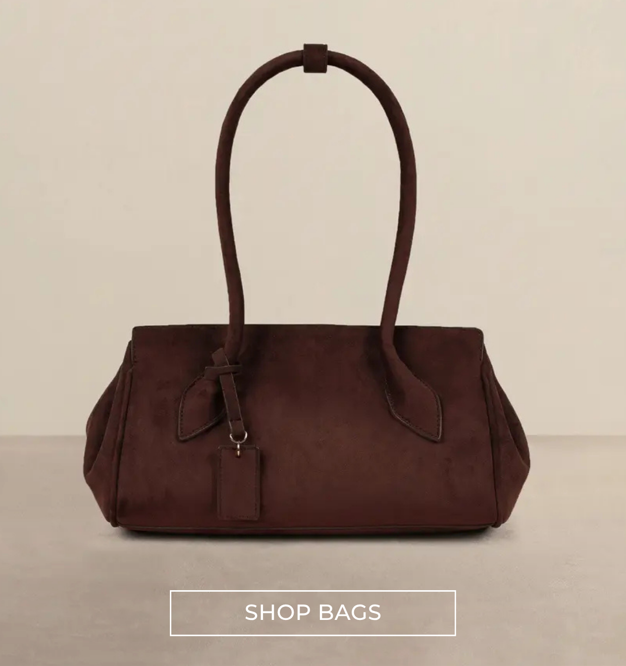 brown suede bag with suede brown handles at SIMMI London