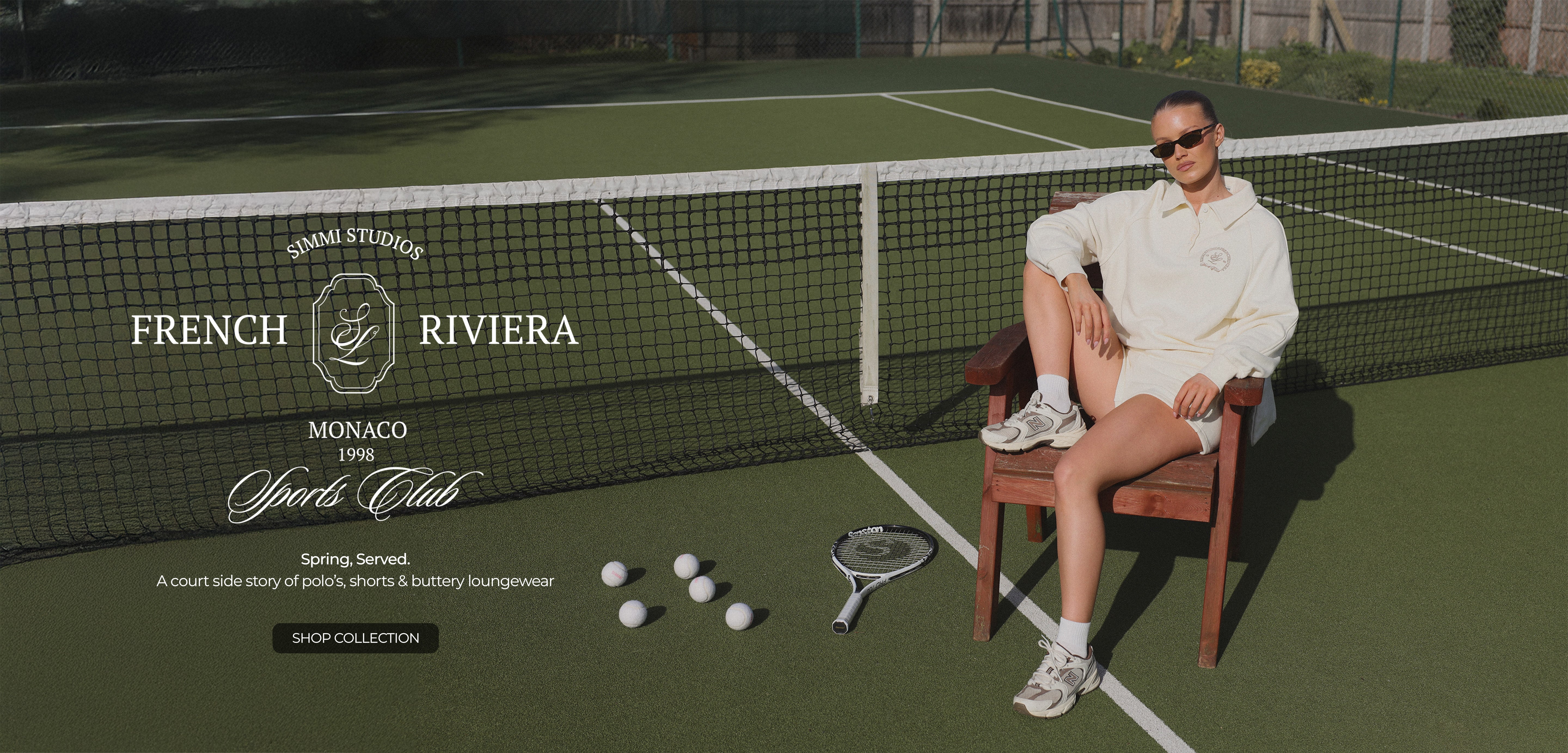 Woman sitting on a chair on a tennis court with 'French Riviera' branding.