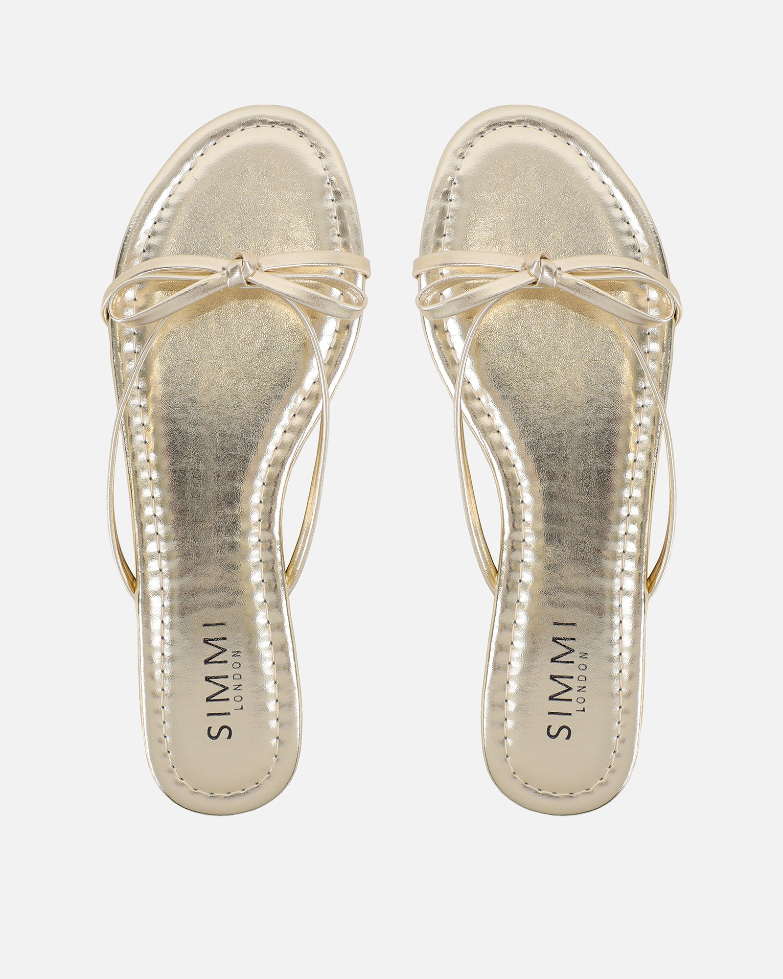 Char Gold Mettalic Bow Sandals | SIMMI London