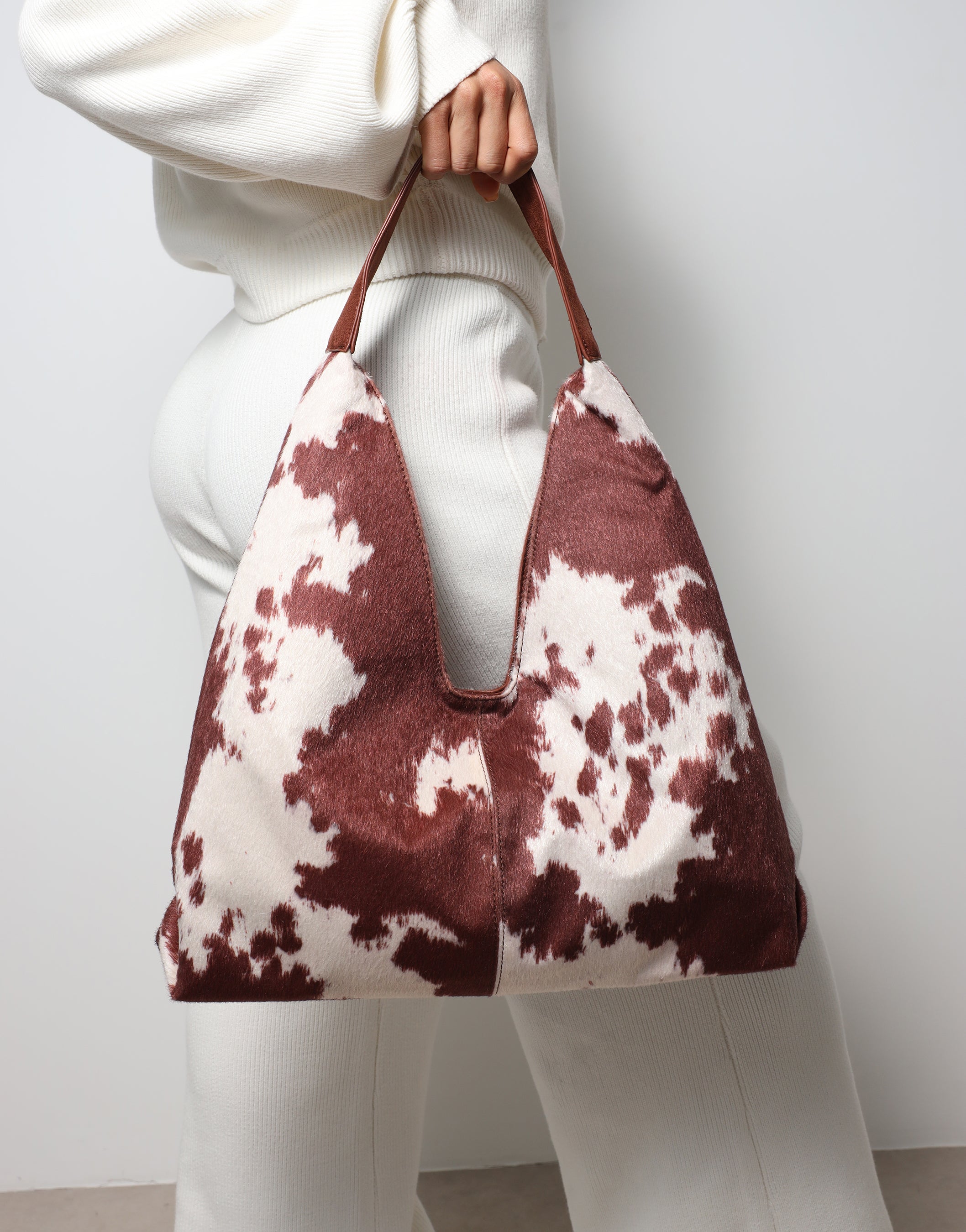 Isla Large Cow Print Suede Shoulder Bag | SIMMI London