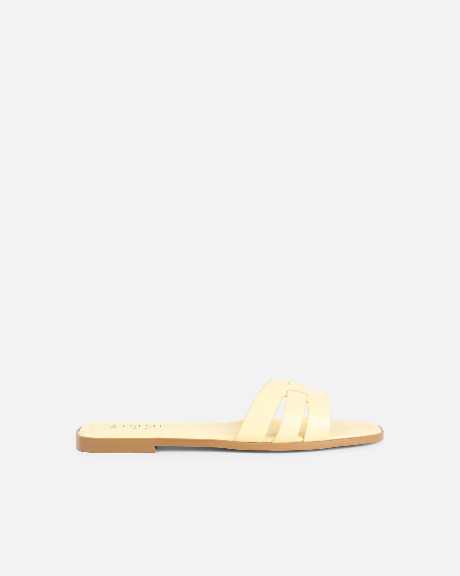 Jorja Butter Yellow Slip On Flat Sandals | SIMMI London