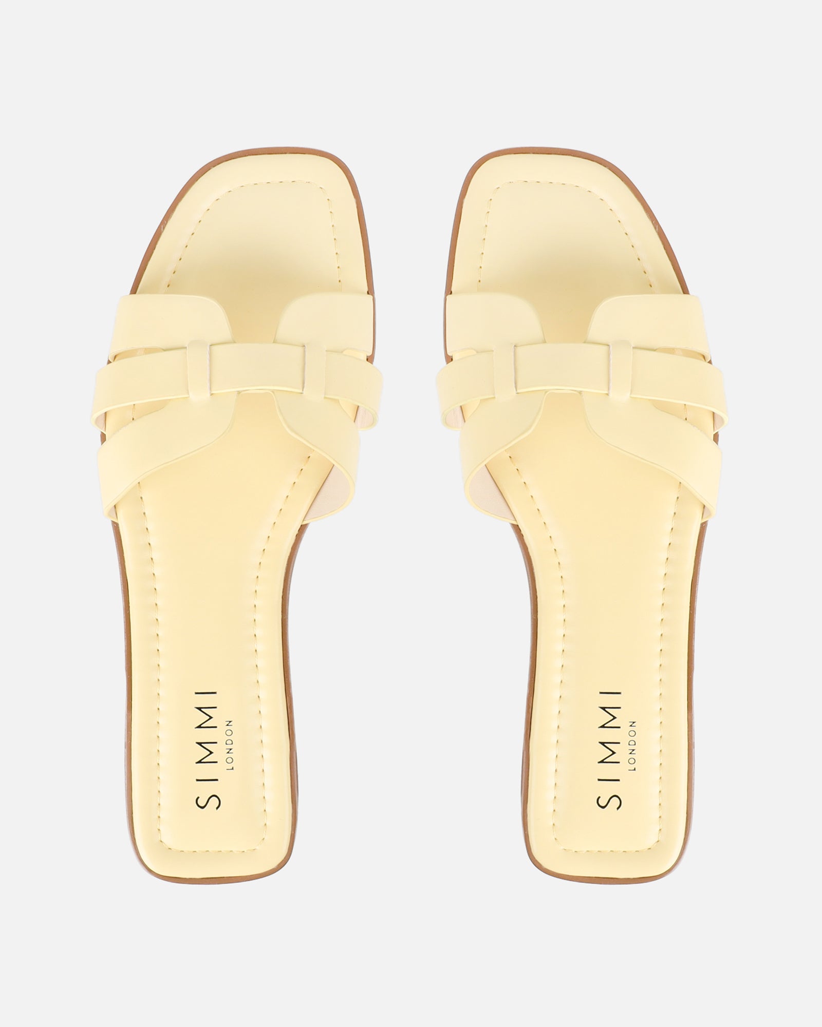 Jorja Butter Yellow Slip On Flat Sandals | SIMMI London