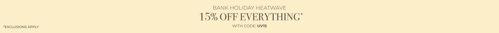 Promotional banner with 15% off everything text on a beige background