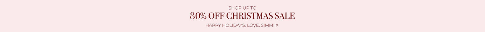 Promotional banner with 20% off Christmas sale text on a pink background