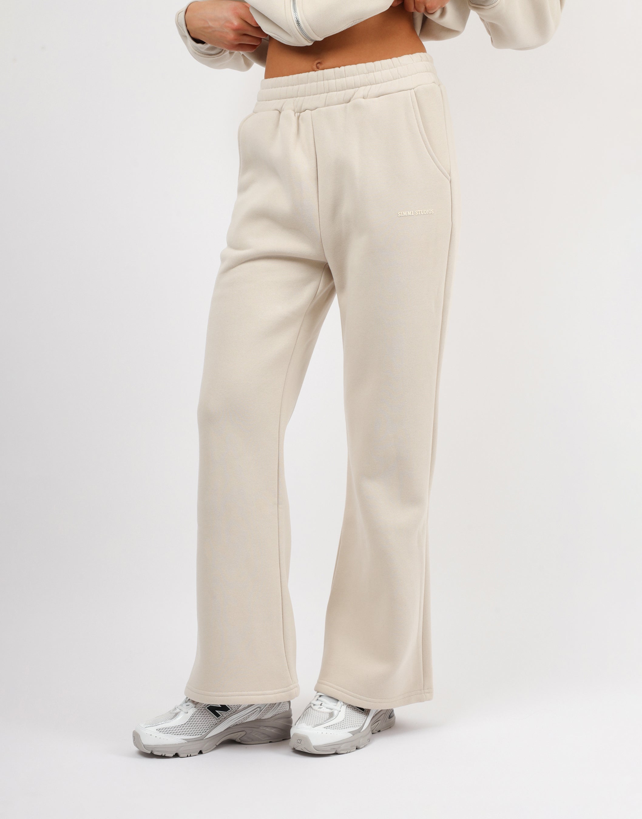 Maddie Simmi Studios Essentials Flared Joggers in Light Beige | SIMMI London