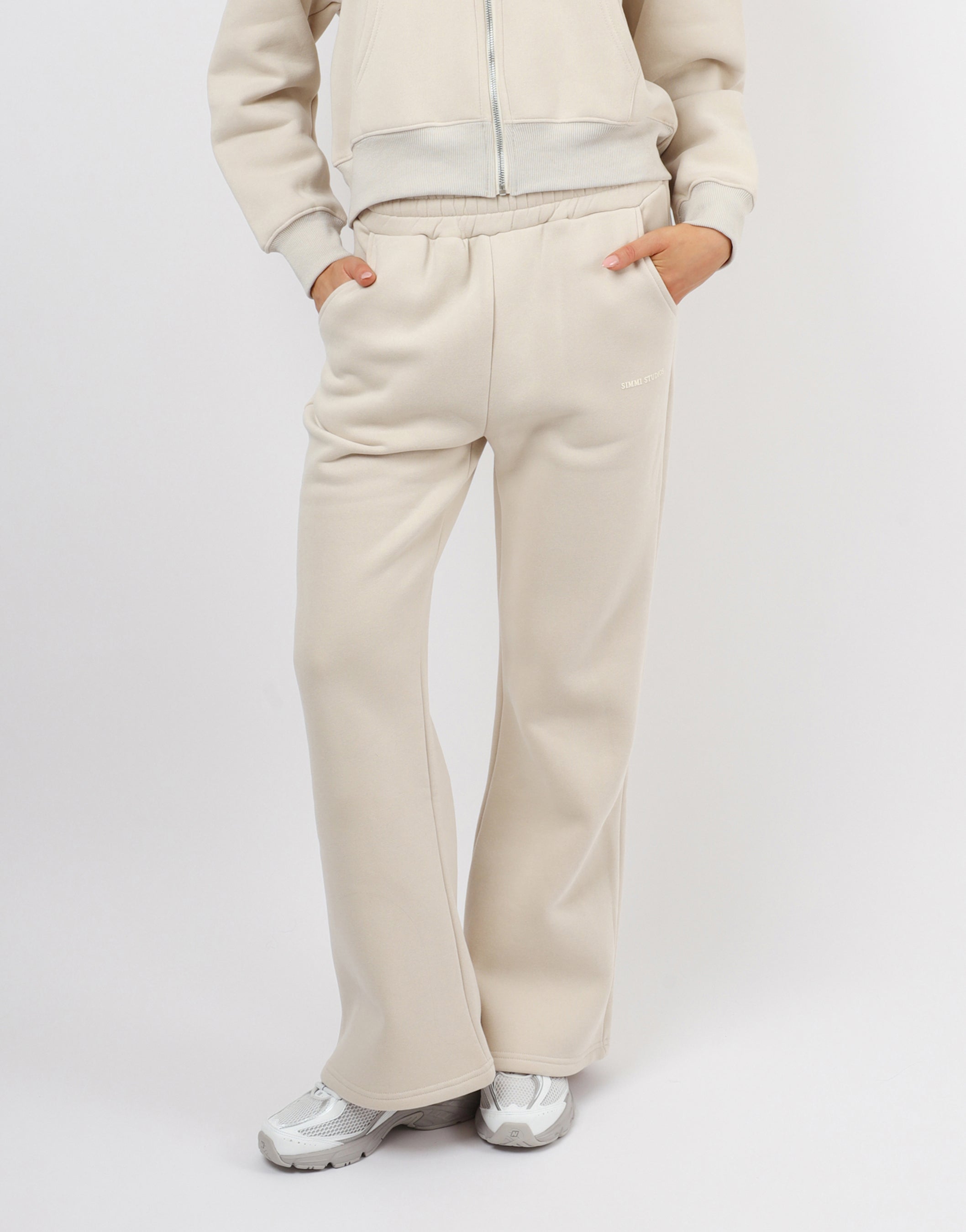 Maddie Simmi Studios Essentials Flared Joggers in Light Beige | SIMMI London