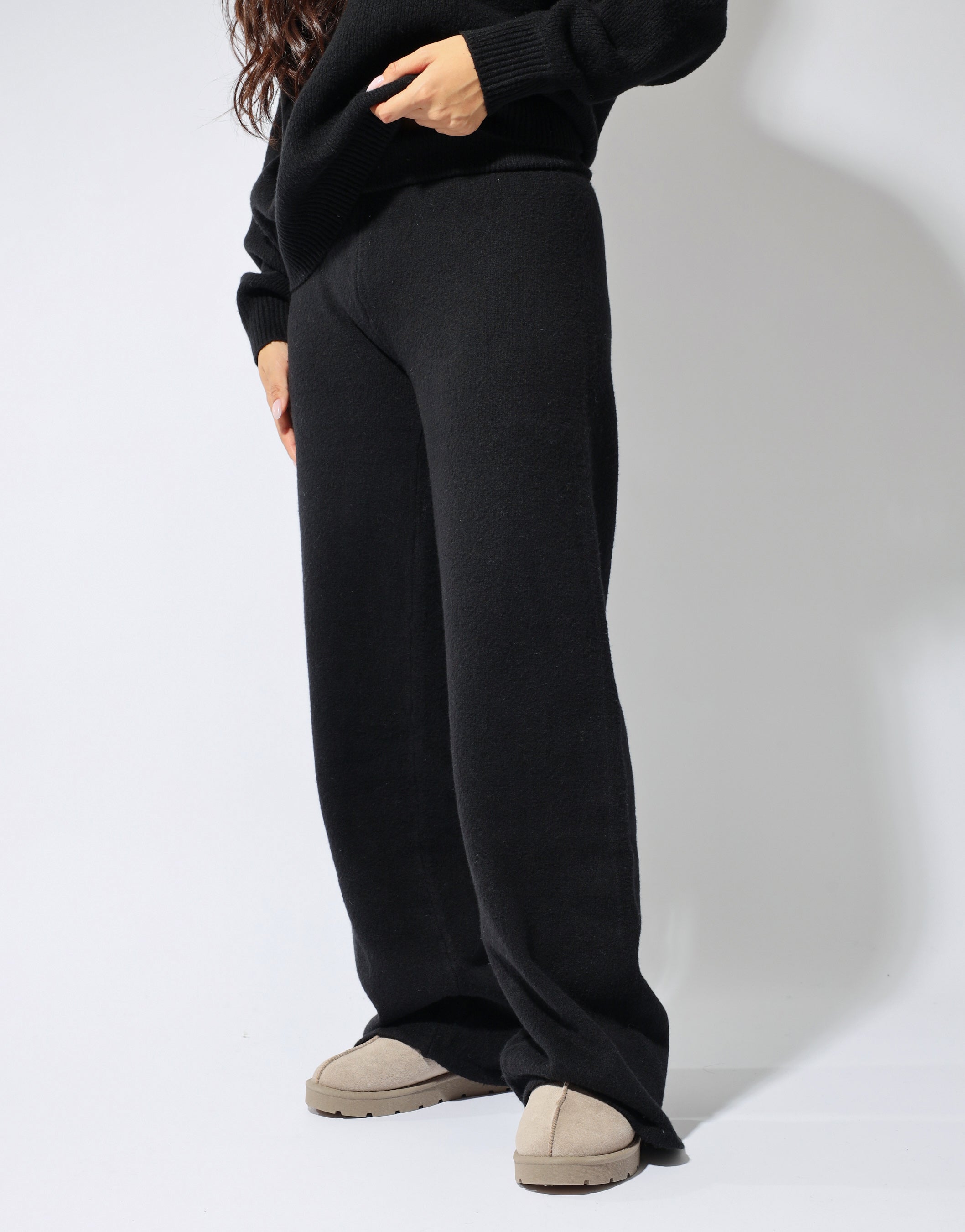 Eve simmi studios soft touch wide leg trousers in black | SIMMI London