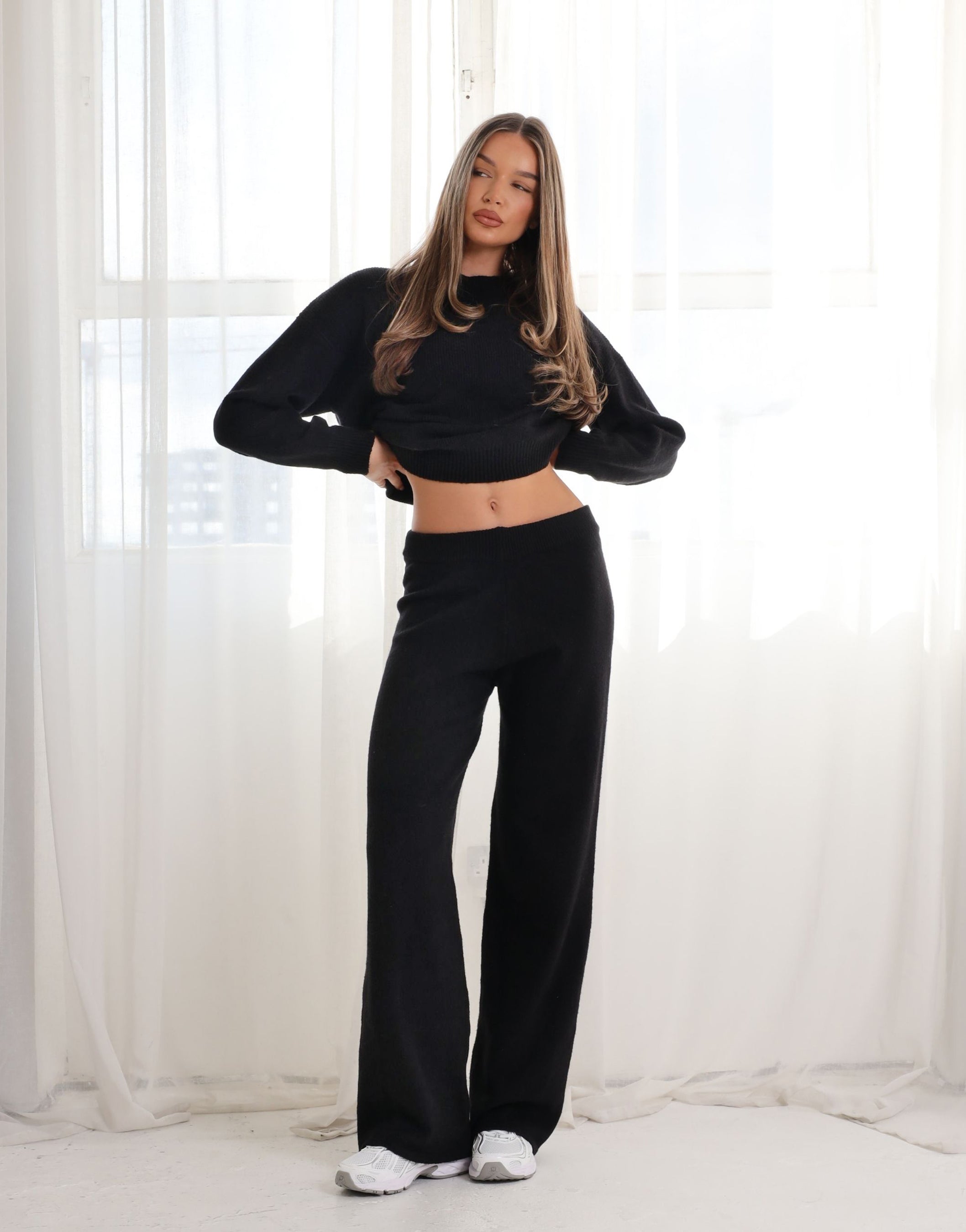 Eve simmi studios soft touch wide leg trousers in black | SIMMI London