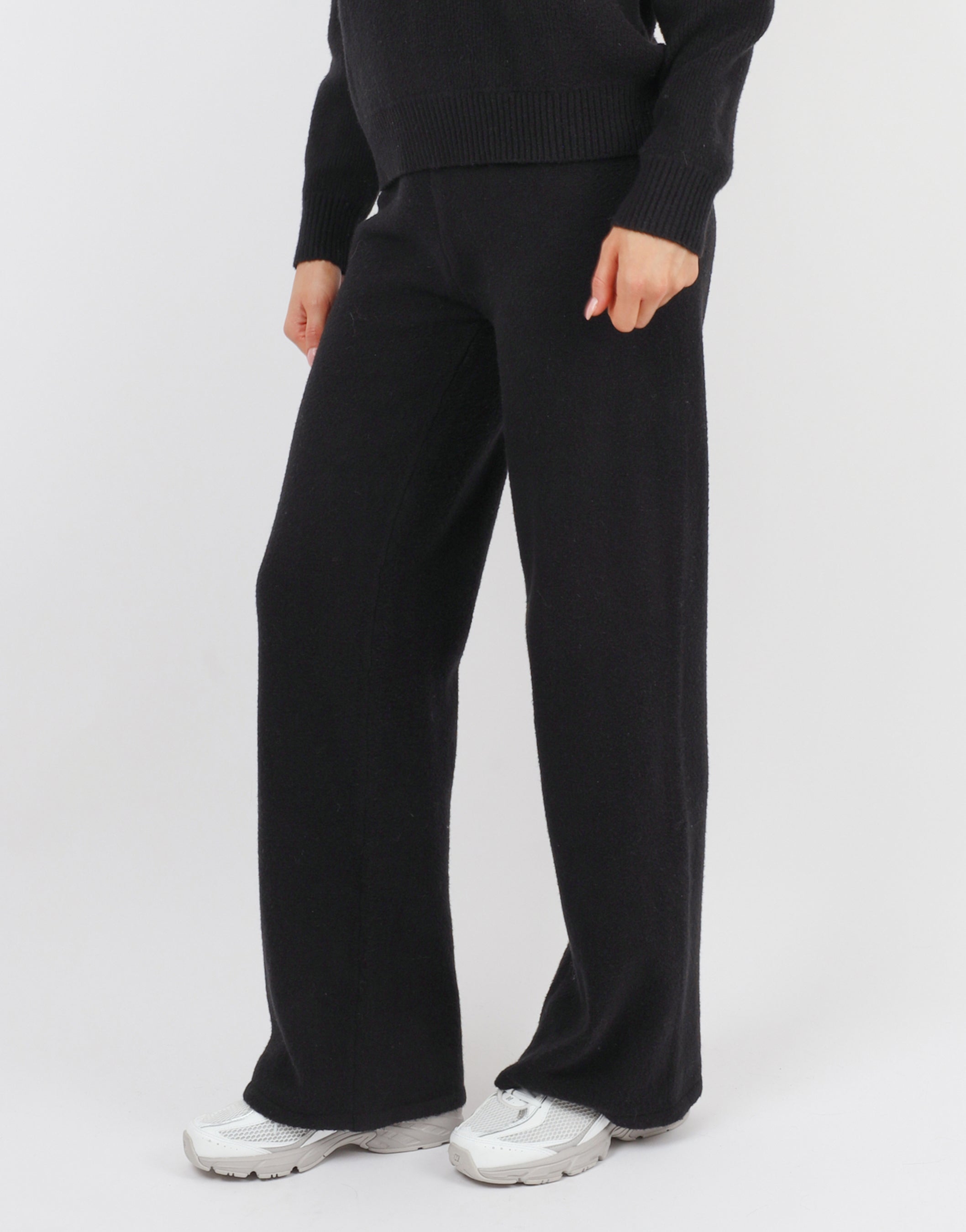 Eve simmi studios soft touch wide leg trousers in black | SIMMI London