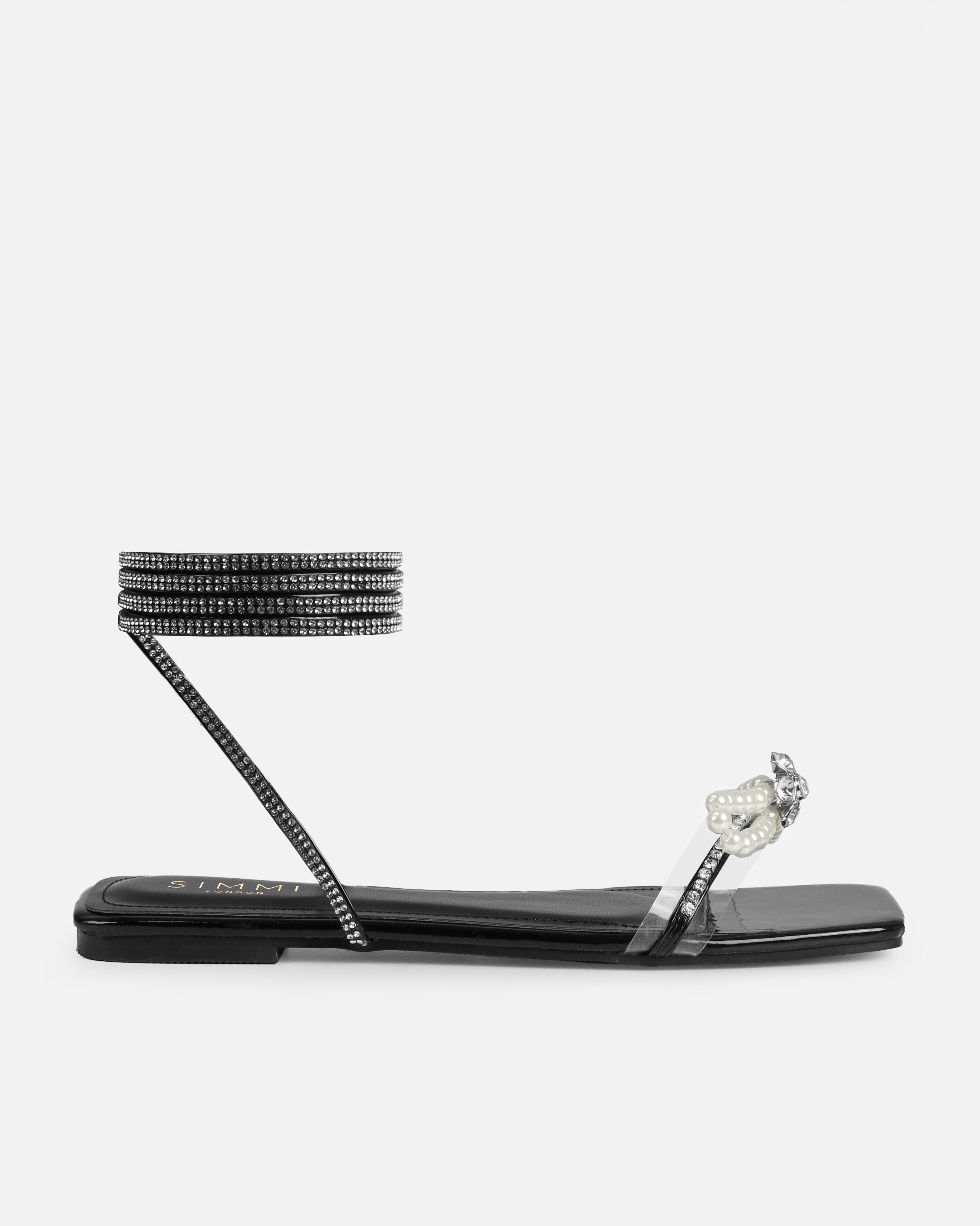 Saturn Black Clear Pearl Bow Lace Up Flat Sandals | SIMMI London
