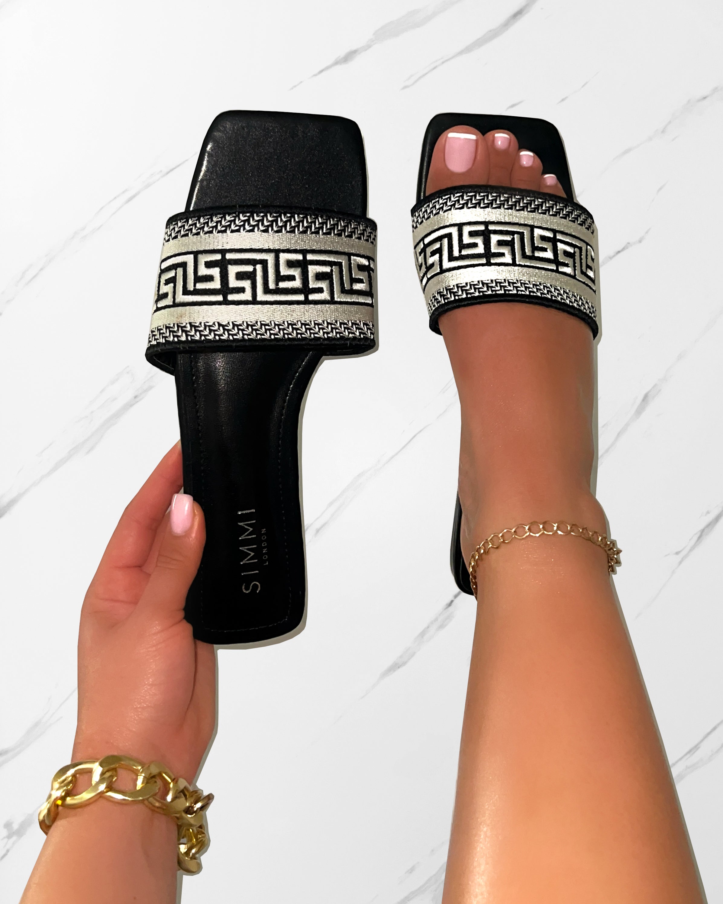 Solene Black Embroidered Logo Flat Slides | SIMMI London