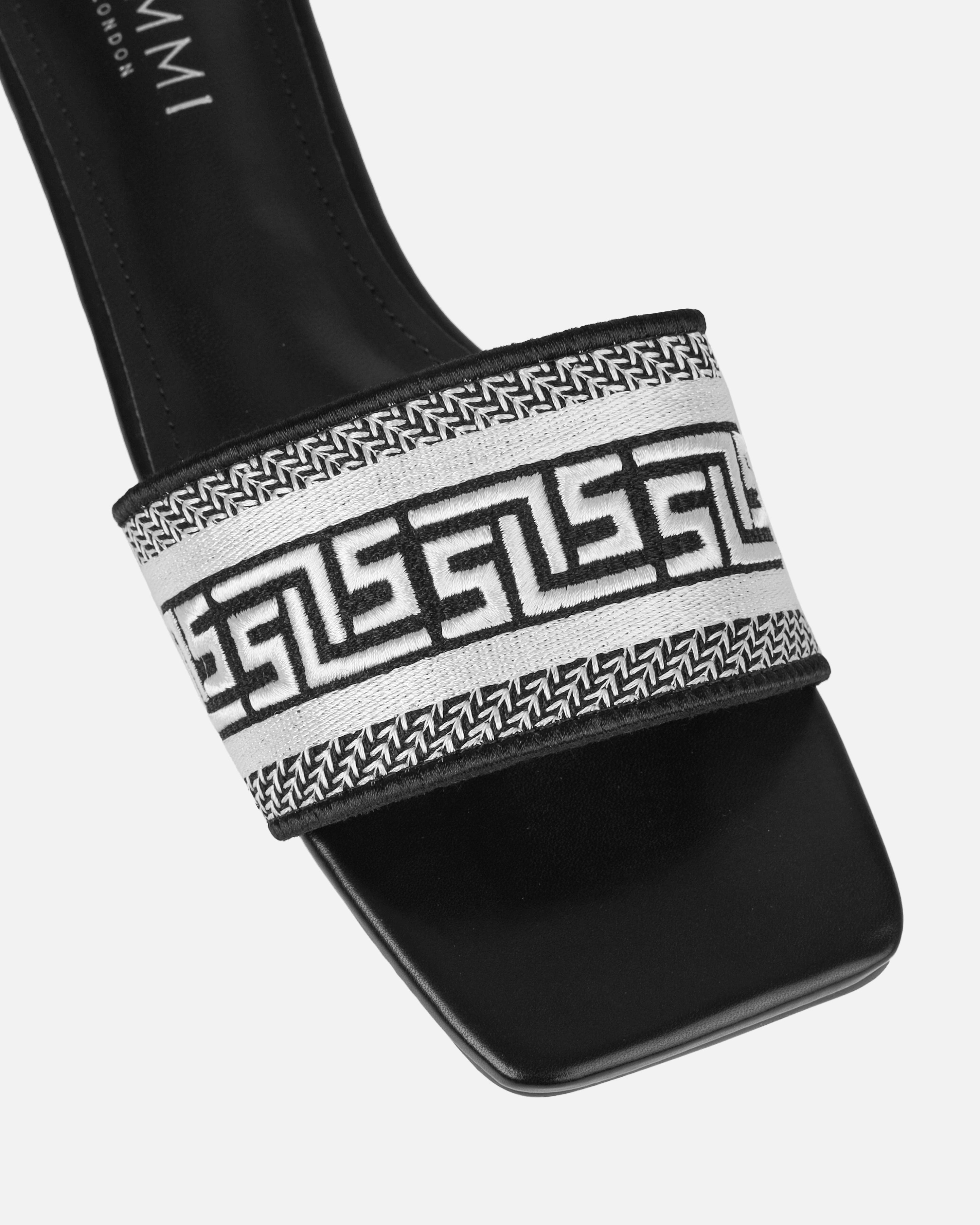 Solene Black Embroidered Logo Flat Slides | SIMMI London