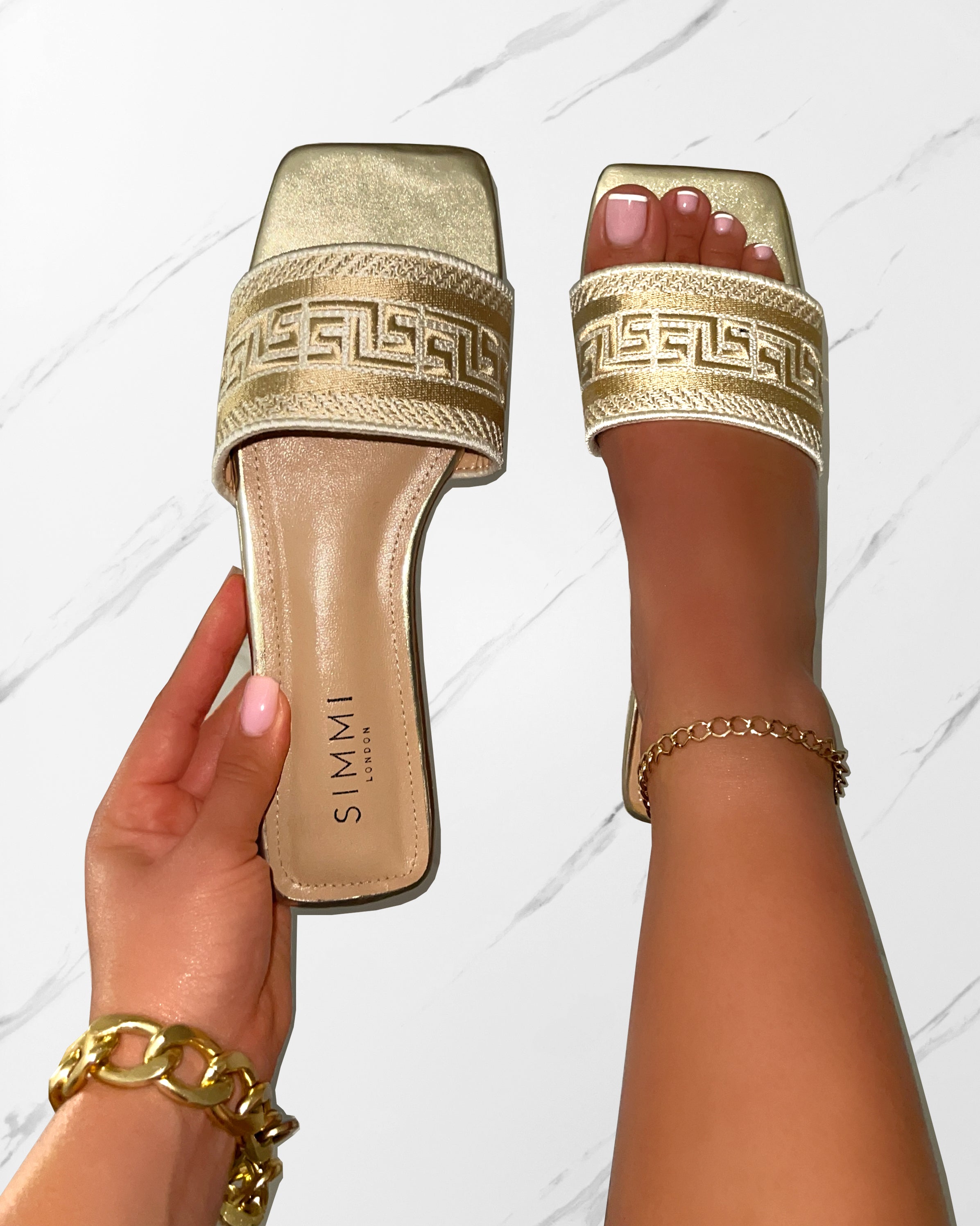 Solene Gold Embroidered Logo Flat Slides | SIMMI London