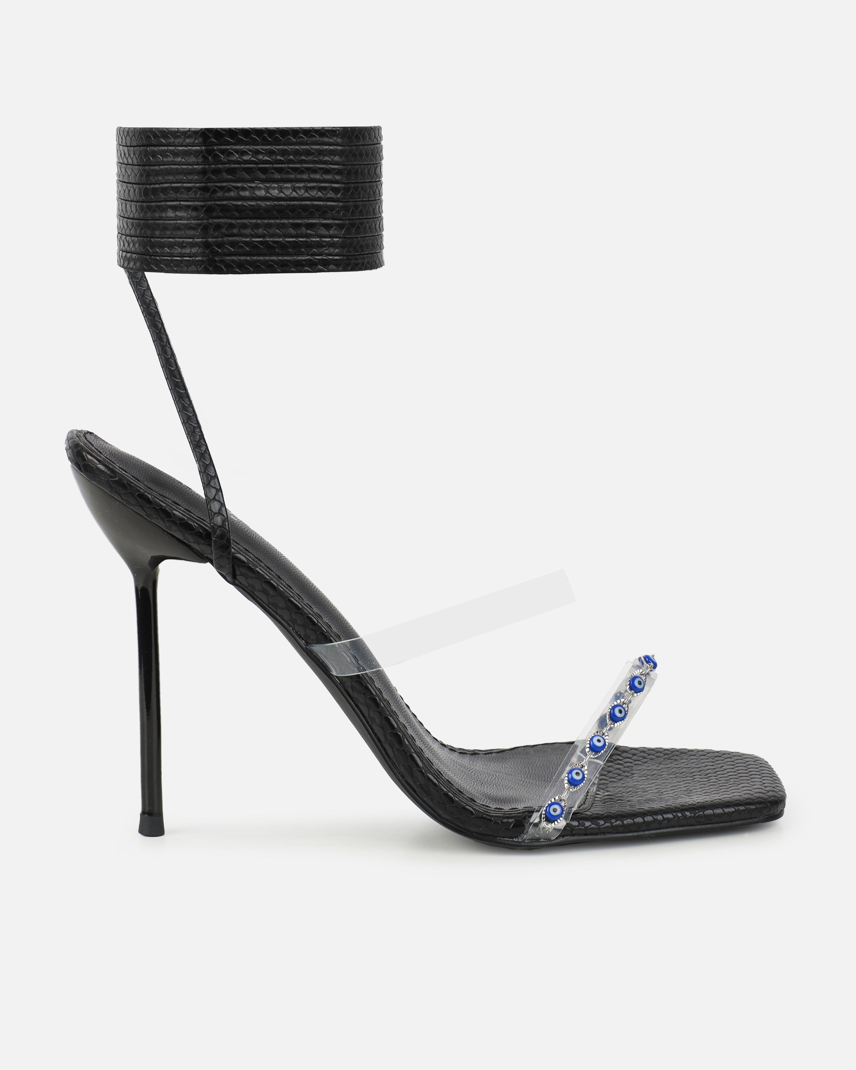 Anyah Black Faux Snake Evil Eye Detail Tie Up Heels | SIMMI London