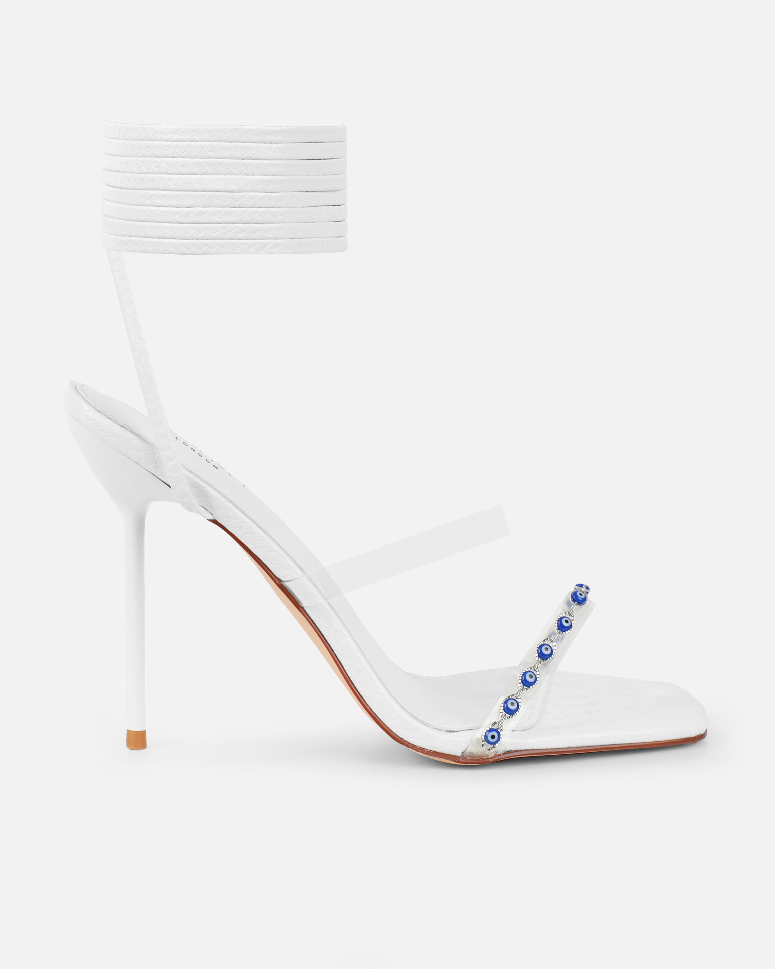 Anyah White Faux Snake Evil Eye Detail Tie Up Heels | SIMMI London