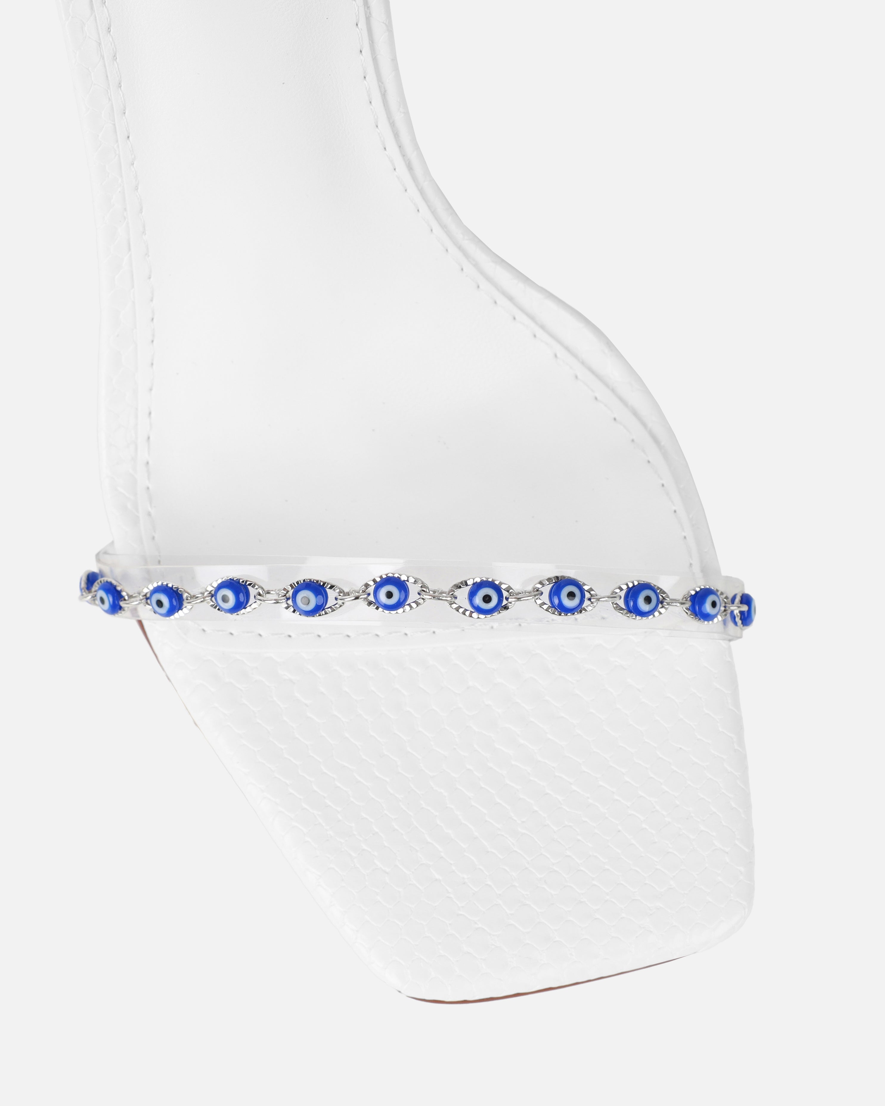 Anyah White Faux Snake Evil Eye Detail Tie Up Heels | SIMMI London