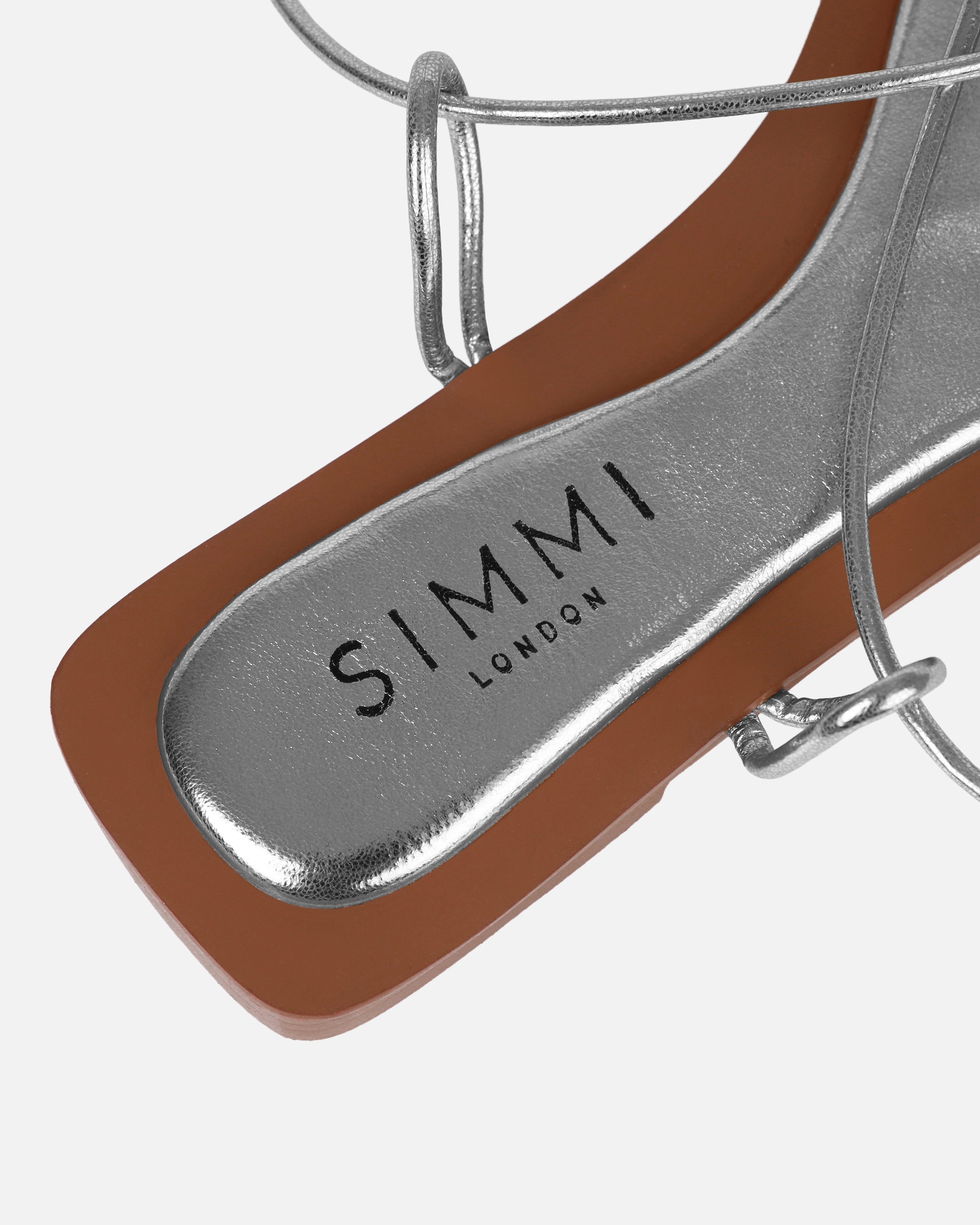 Cosmina Silver Metallic Lace Up Flat Sandals | SIMMI London