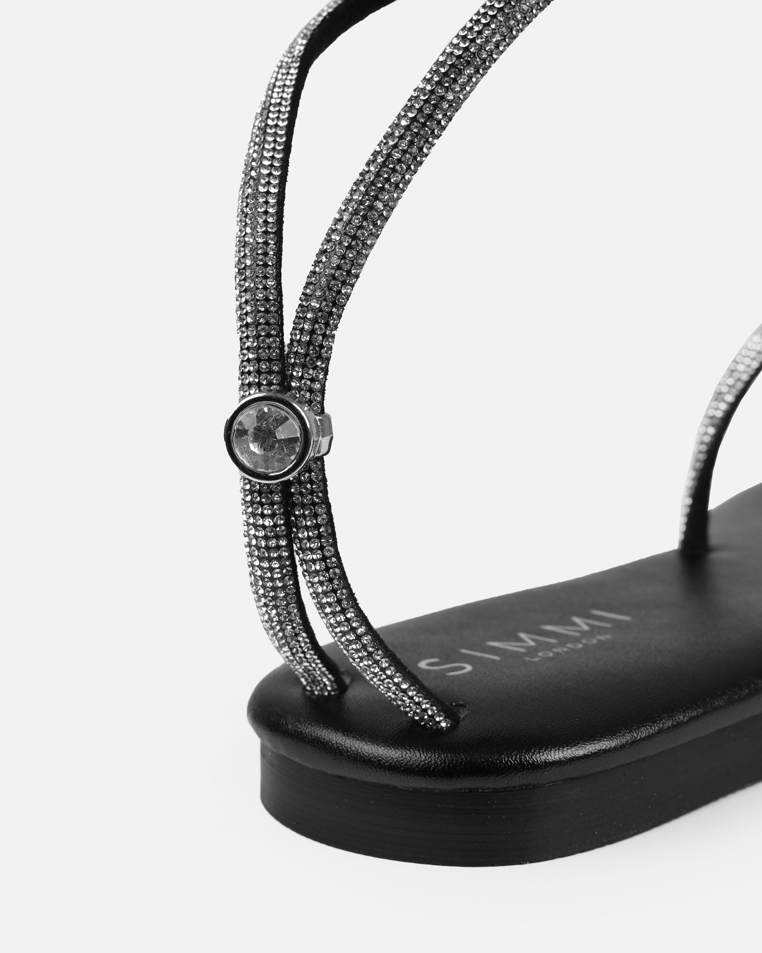Elio Black Diamante Toe Thong Toggle Flat Sandals | SIMMI London
