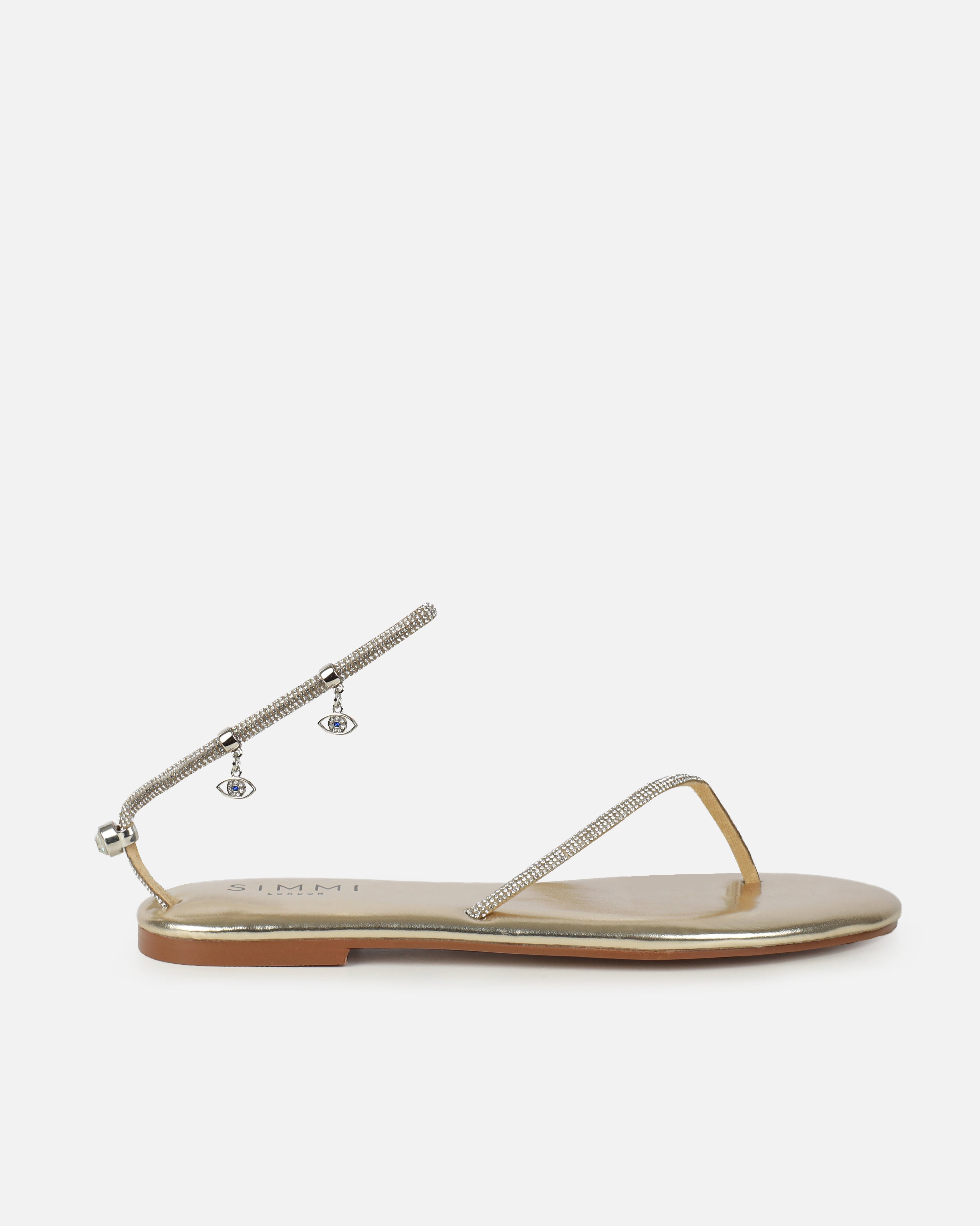 Dakoa Gold Metallic Evil Eye Charm Flat Sandals | SIMMI London