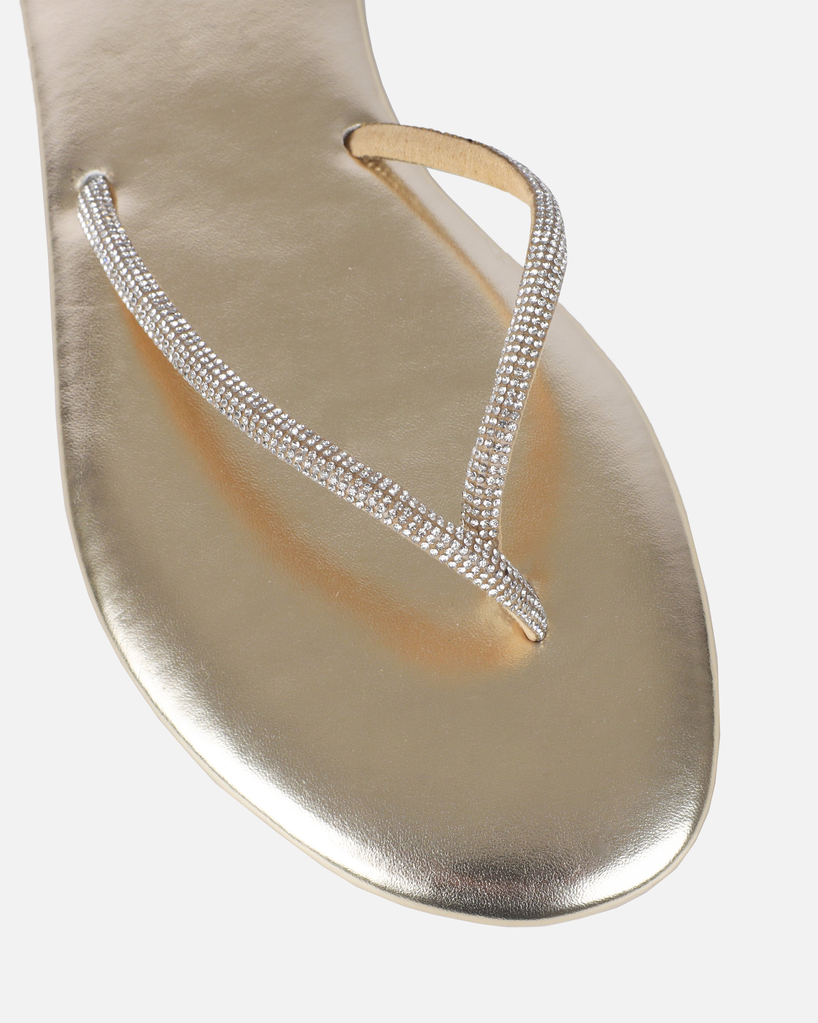 Dakoa Gold Metallic Evil Eye Charm Flat Sandals | SIMMI London