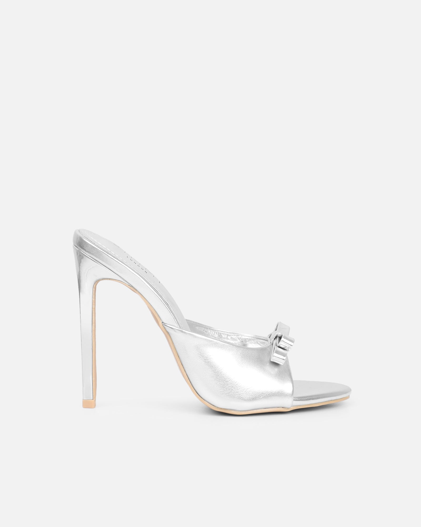 Halima Silver Metallic Bow Detailed Heeled Mules | SIMMI London