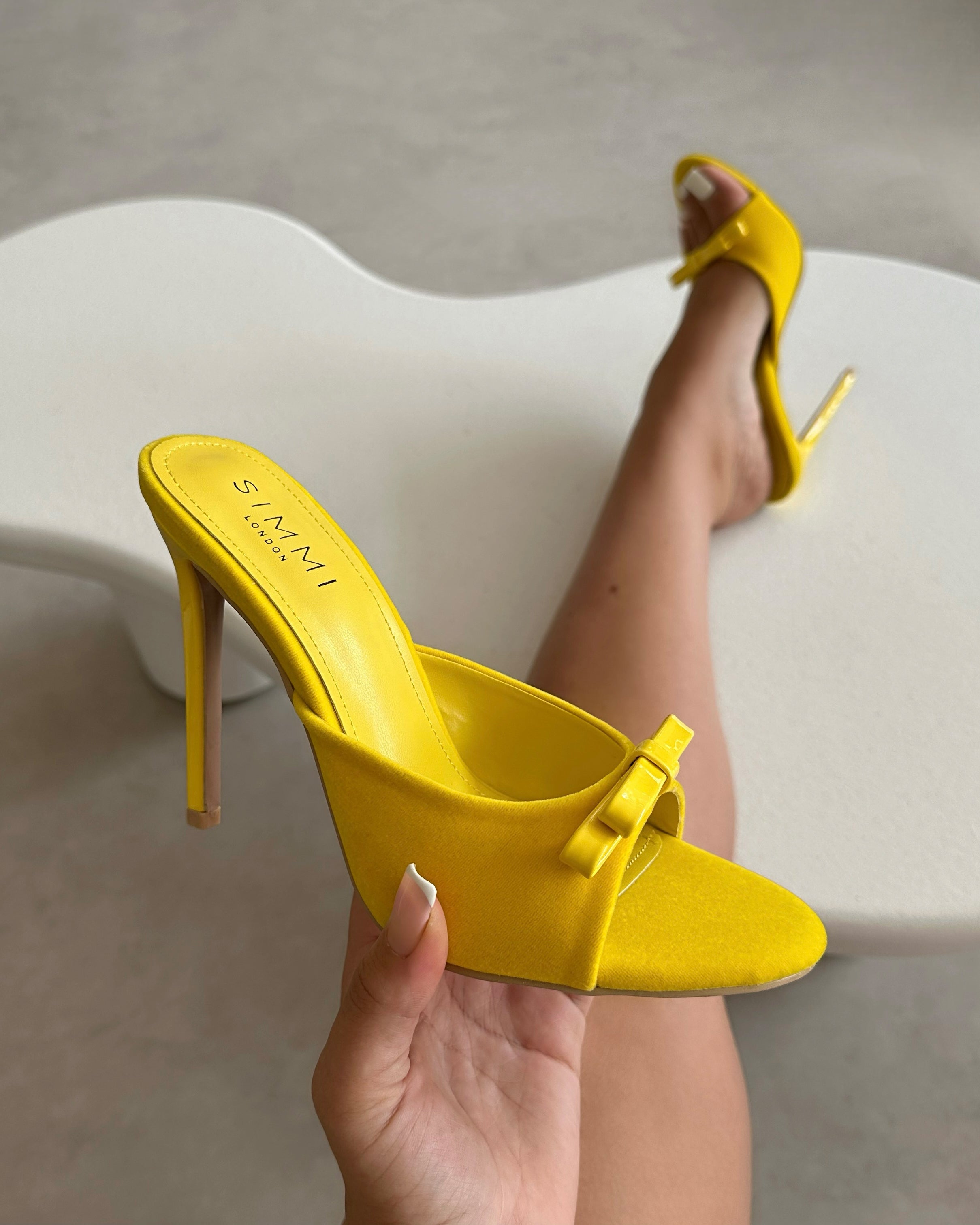 Halima yellow suede bow detail heeled mules | SIMMI London