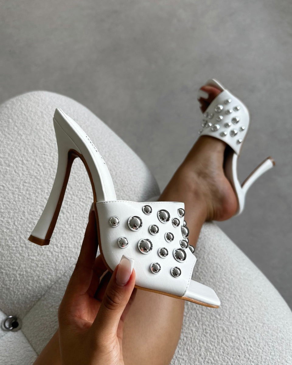 Opalle White Heeled Mules With Silver Studs | SIMMI London
