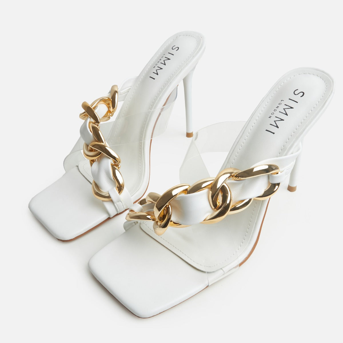 Saige Clear White Asymmetric Chain High Heel Mules | SIMMI London