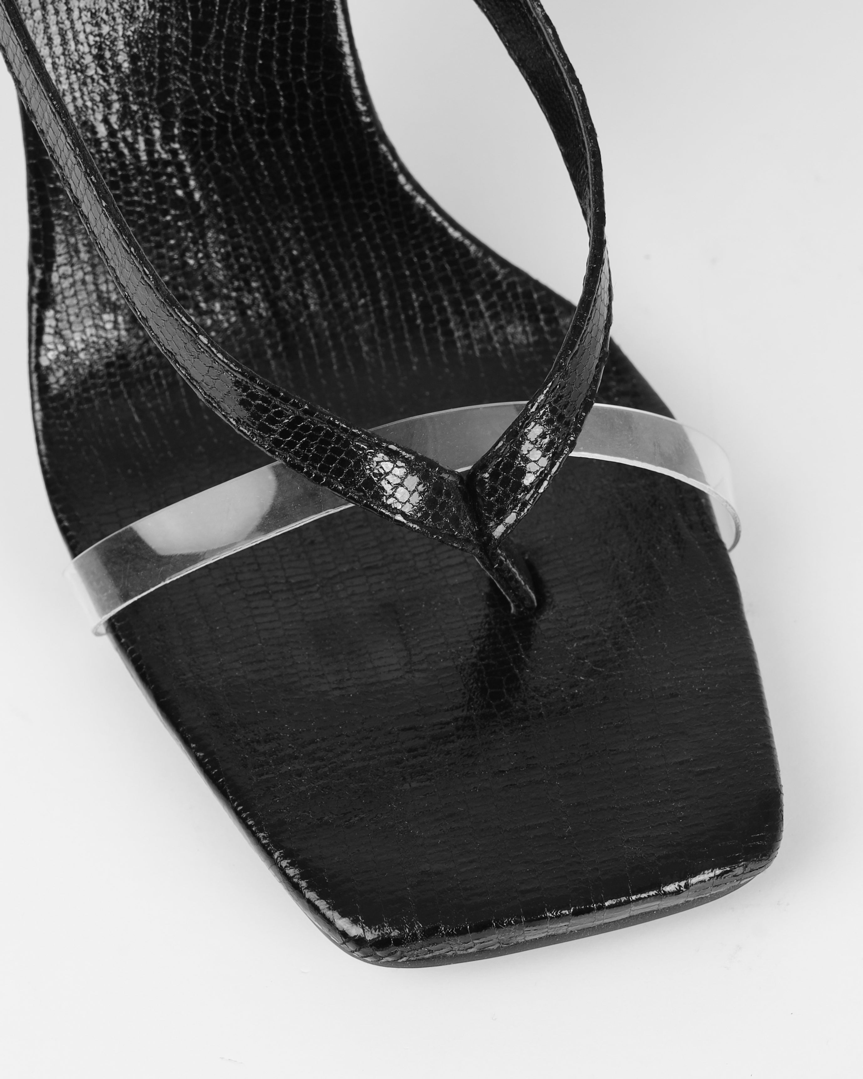 Esmaria Black Faux Lizard Print Clear Diamante Toe Thong Heels | SIMMI London