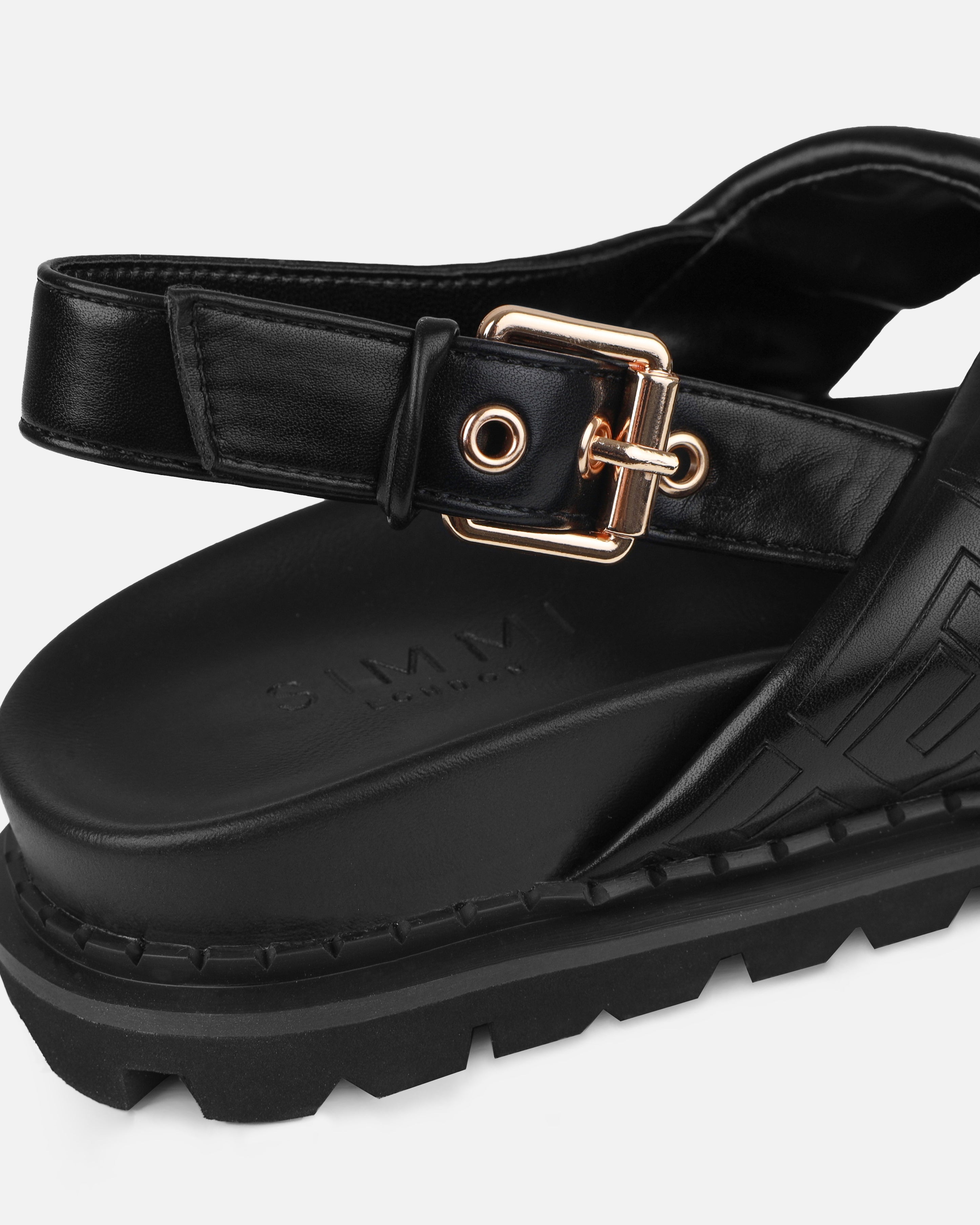 Vaia Black Embossed Cross Over Flat Sandals | SIMMI London