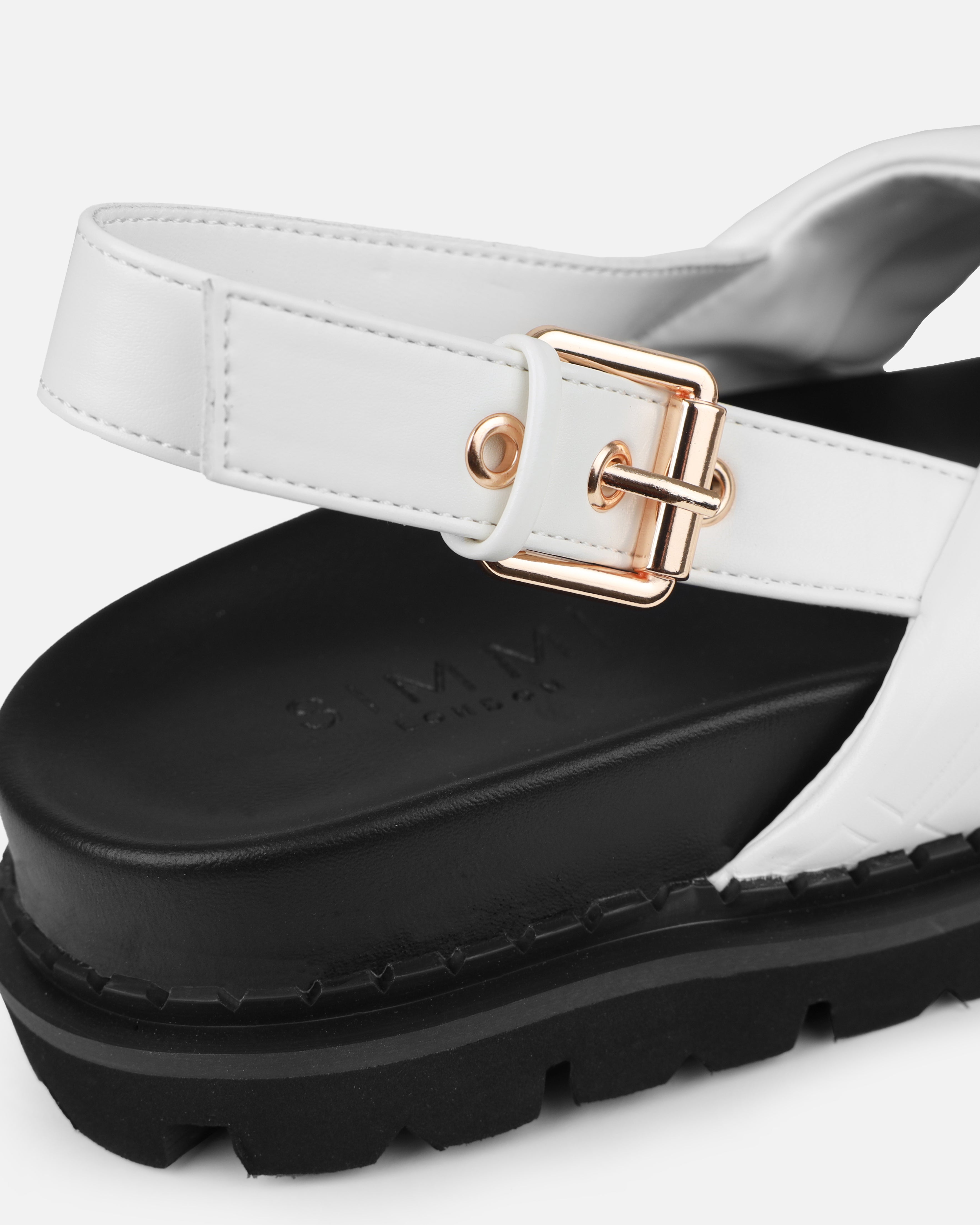 Vaia White Embossed Cross Over Flat Sandals | SIMMI London