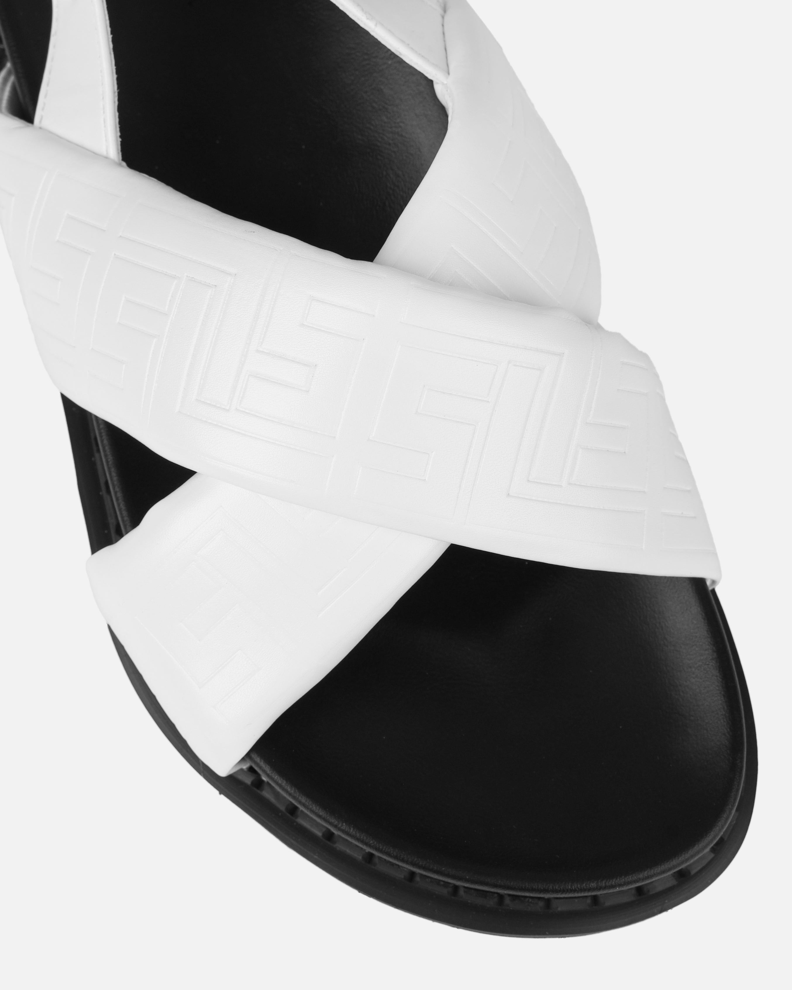 Vaia White Embossed Cross Over Flat Sandals | SIMMI London