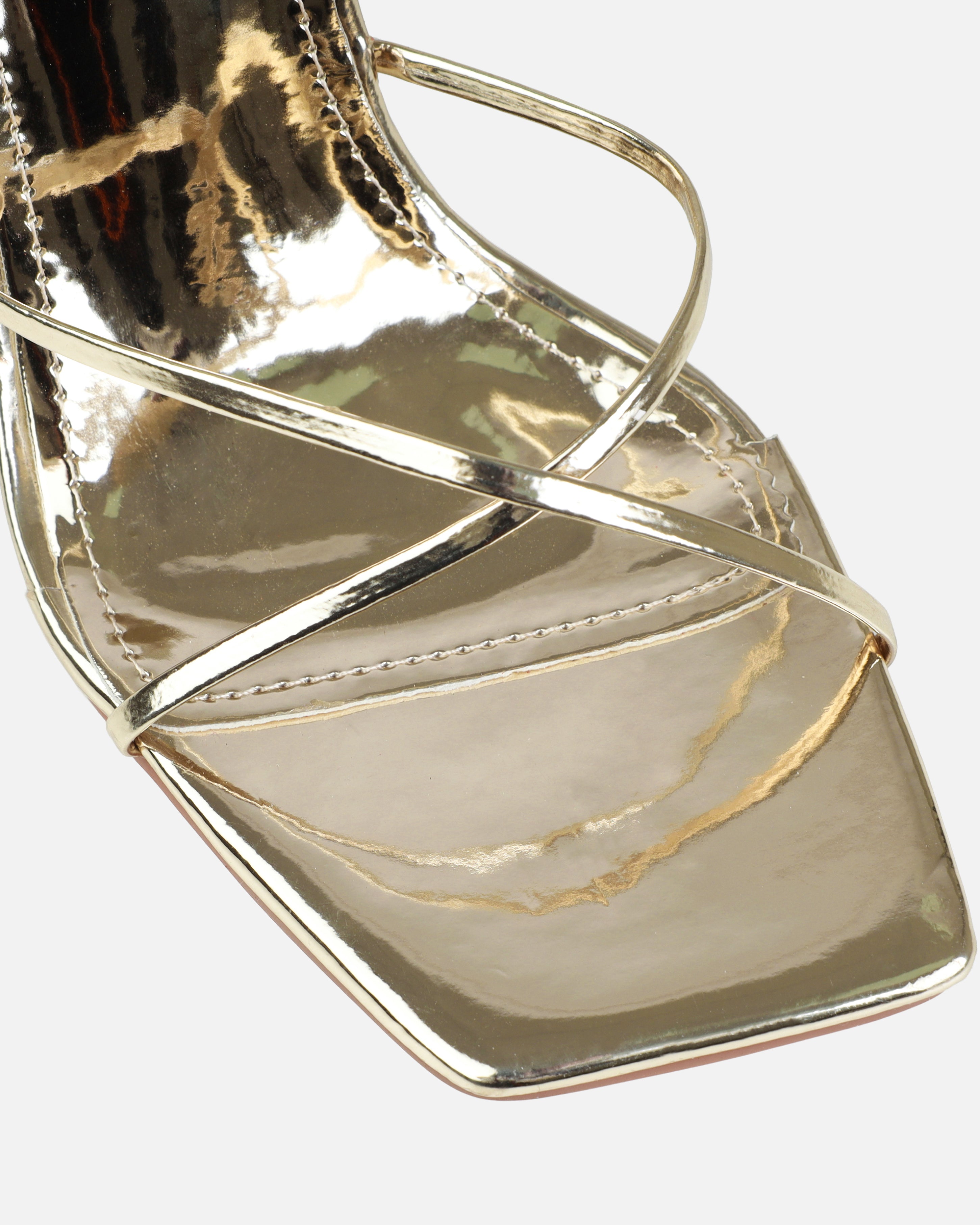 Tasha Ghouri Darii Gold Patent Flared Stiletto Heels | SIMMI London