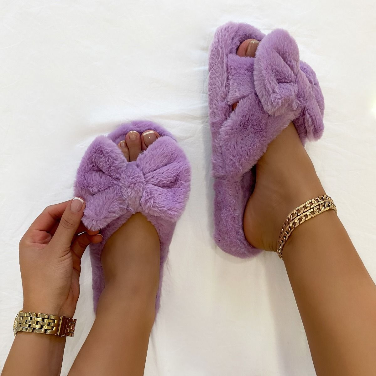 purple fluffy slippers