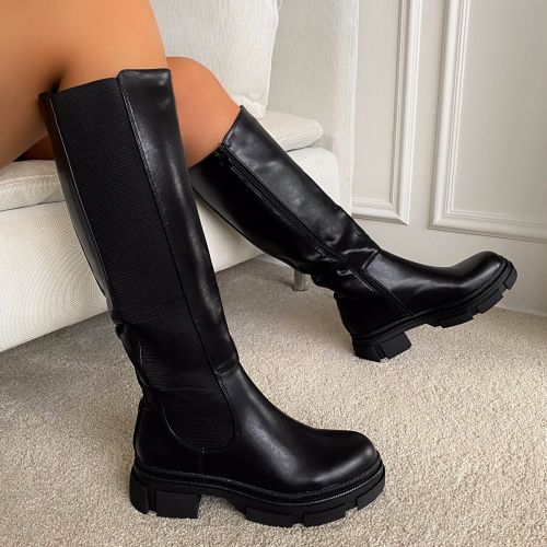 shin high black boots